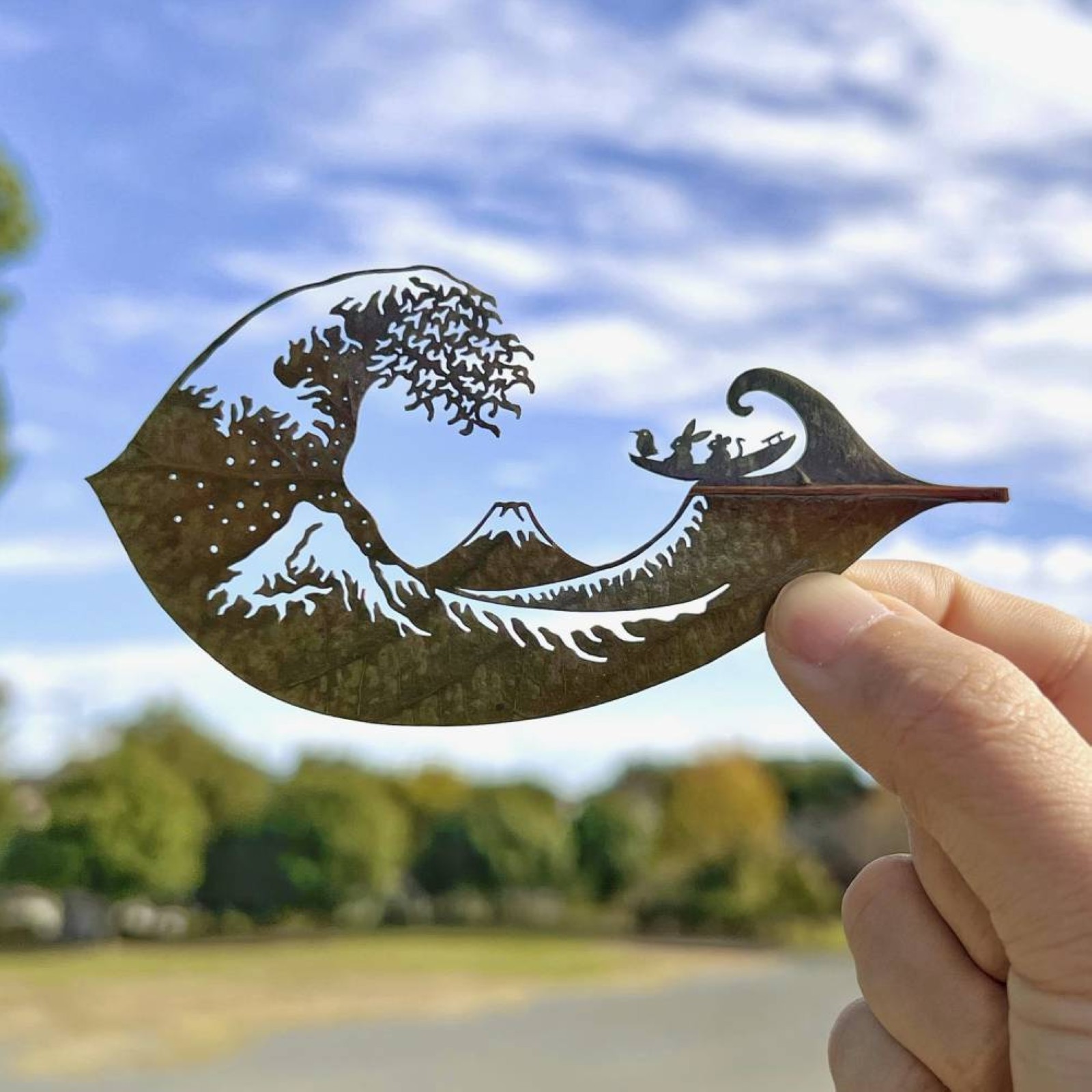 A Japanese artist finds solace and global fans with intricate leaf-cutting