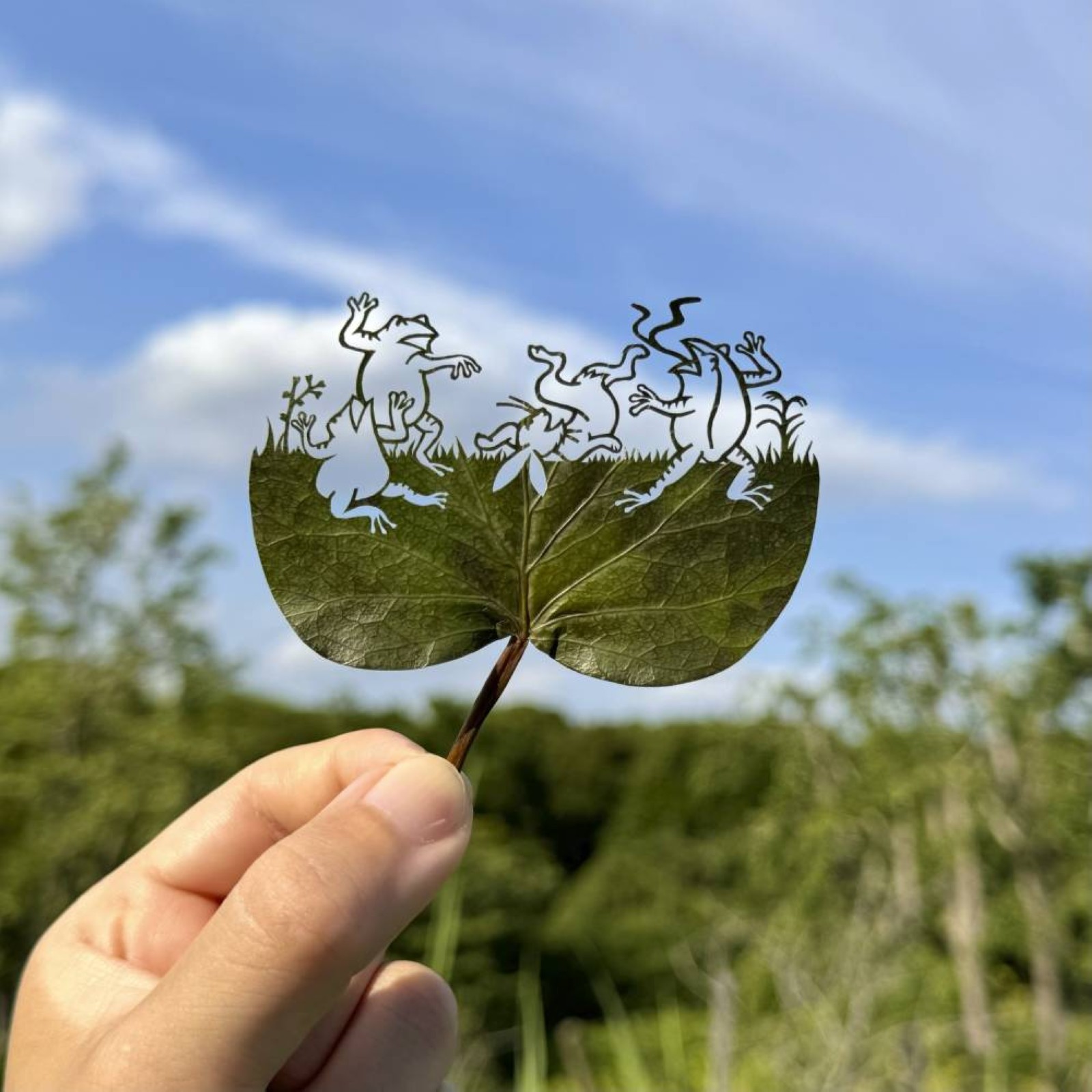 A Japanese artist finds solace and global fans with intricate leaf-cutting