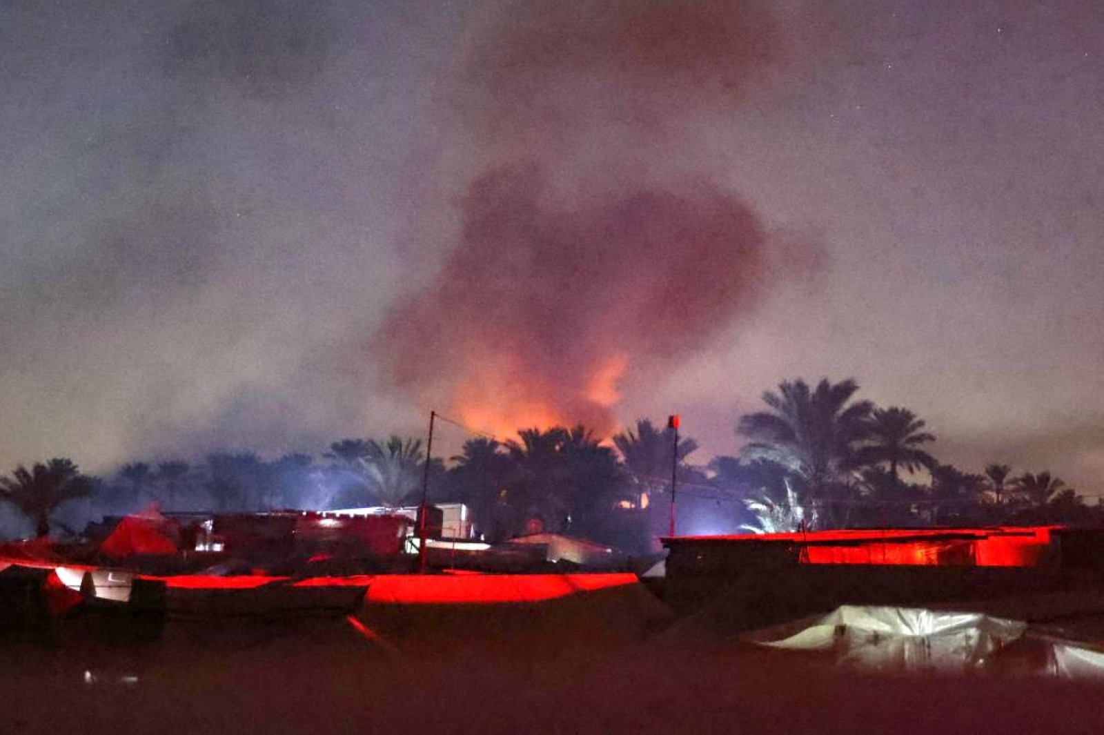 Israeli strike on Gaza tent camp kills 21