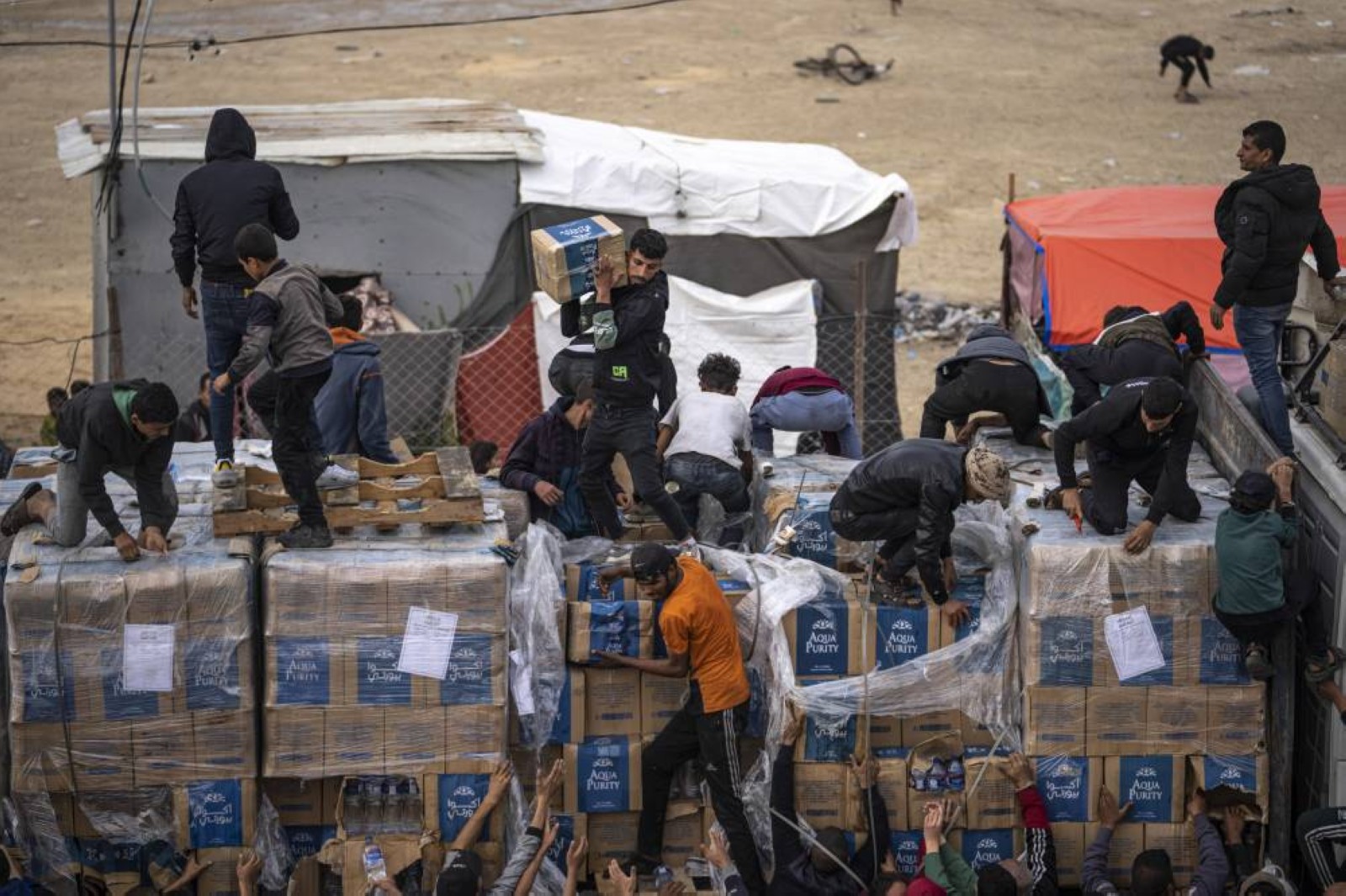 Amnesty says Israel carrying out 'genocide' in Gaza