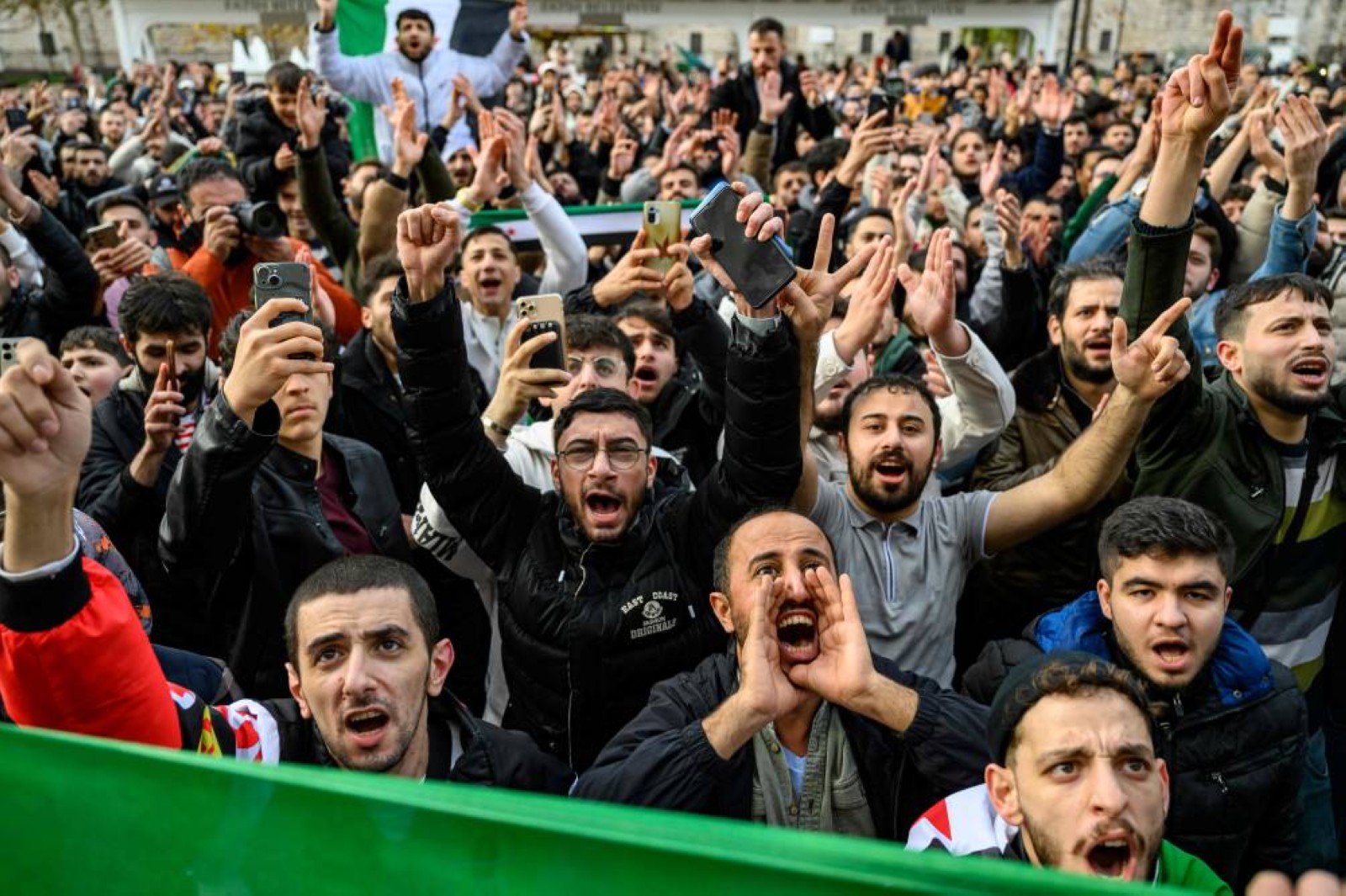 Syrian rebel coalition says it is working to transfer power to transitional governing body