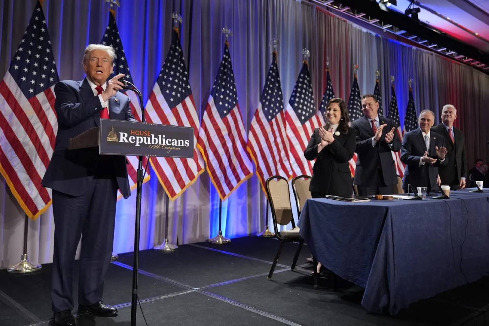 President-elect Donald Trump speaks at a meeting of the House GOP conference, followed by Rep. Elise Stefanik, in Washington. File/Associated Press