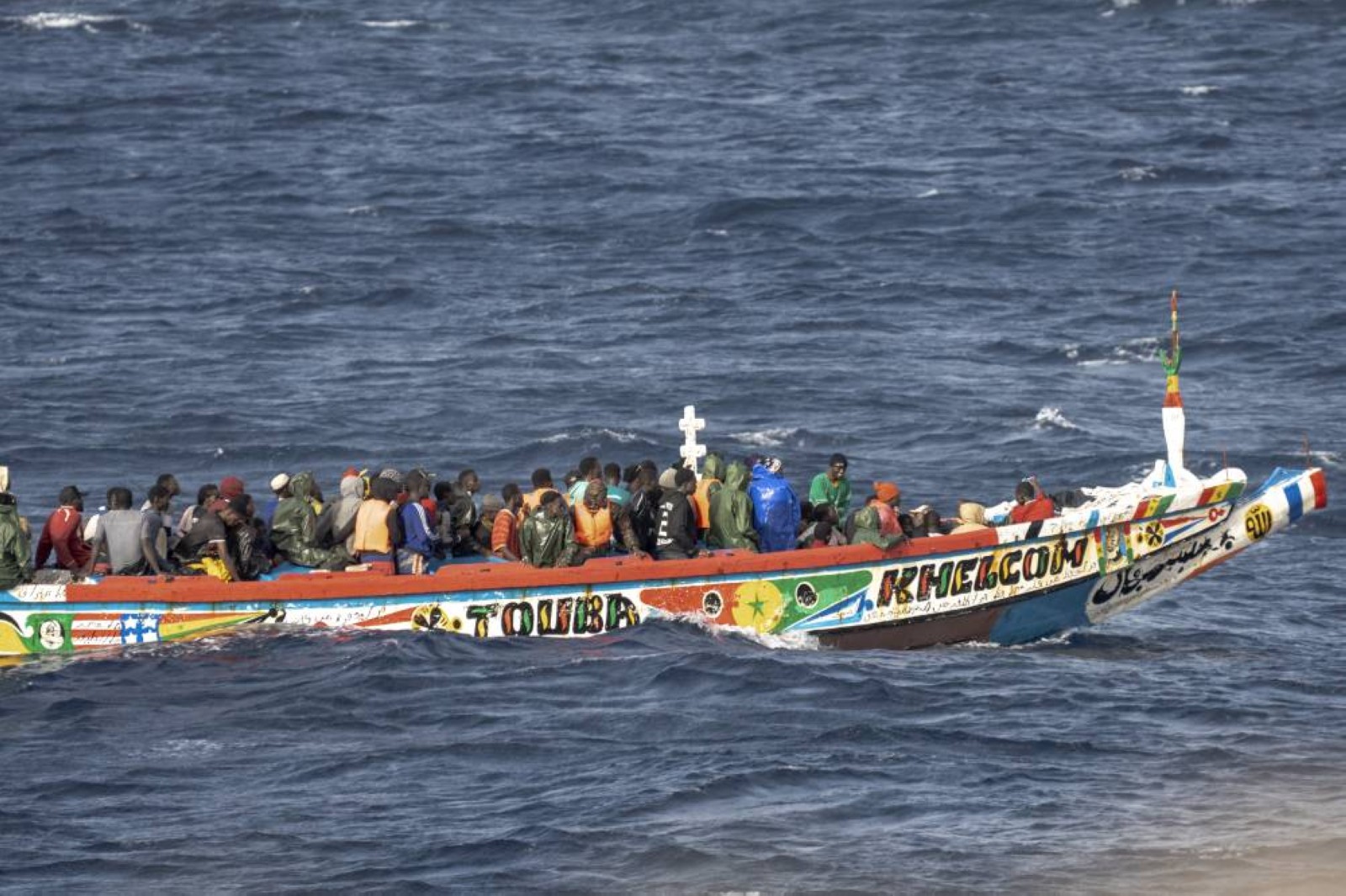 Nearly 70 migrants killed as boat capsizes