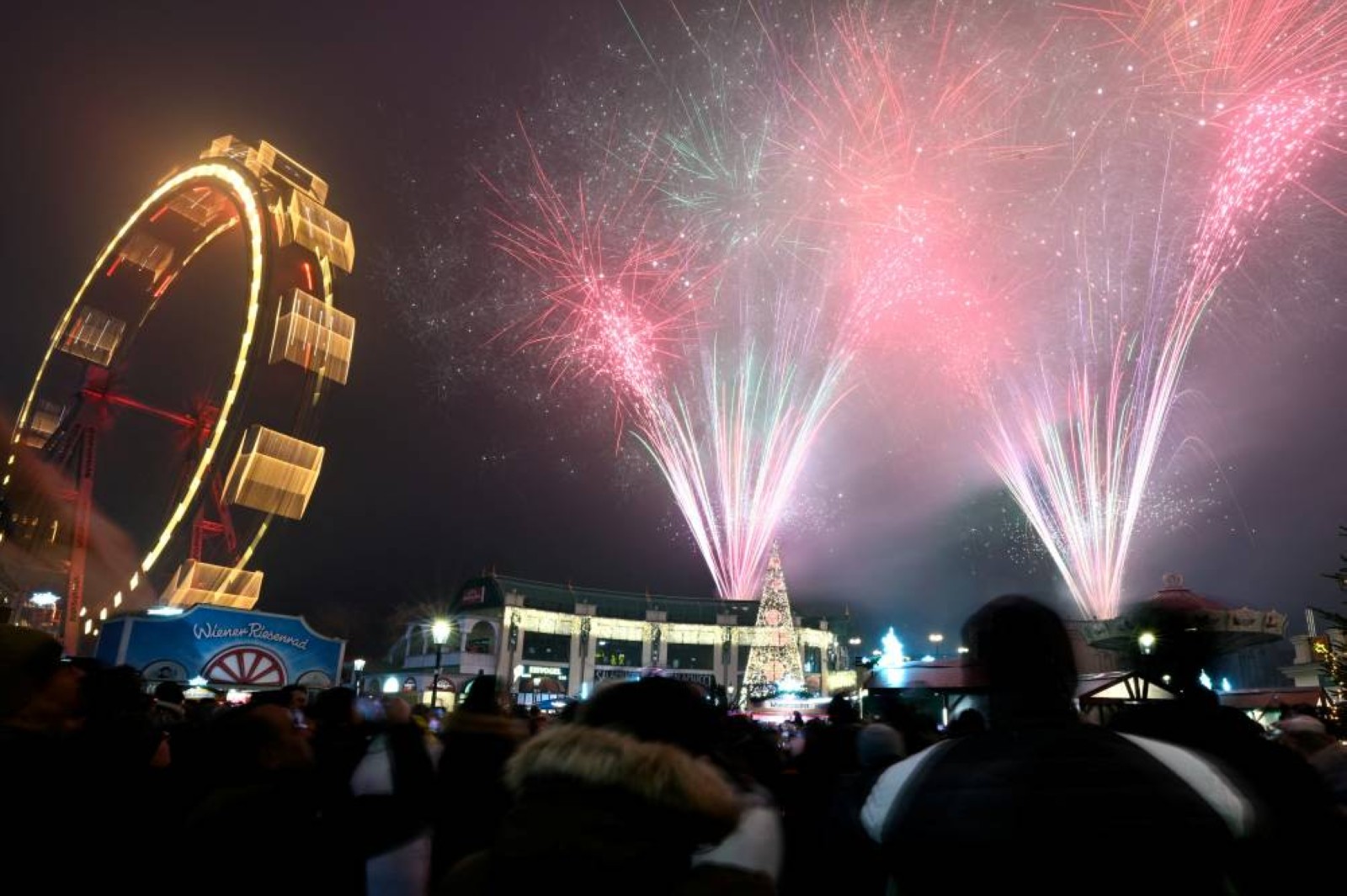 The world welcomes 2025 with light shows, embraces and ice plunges