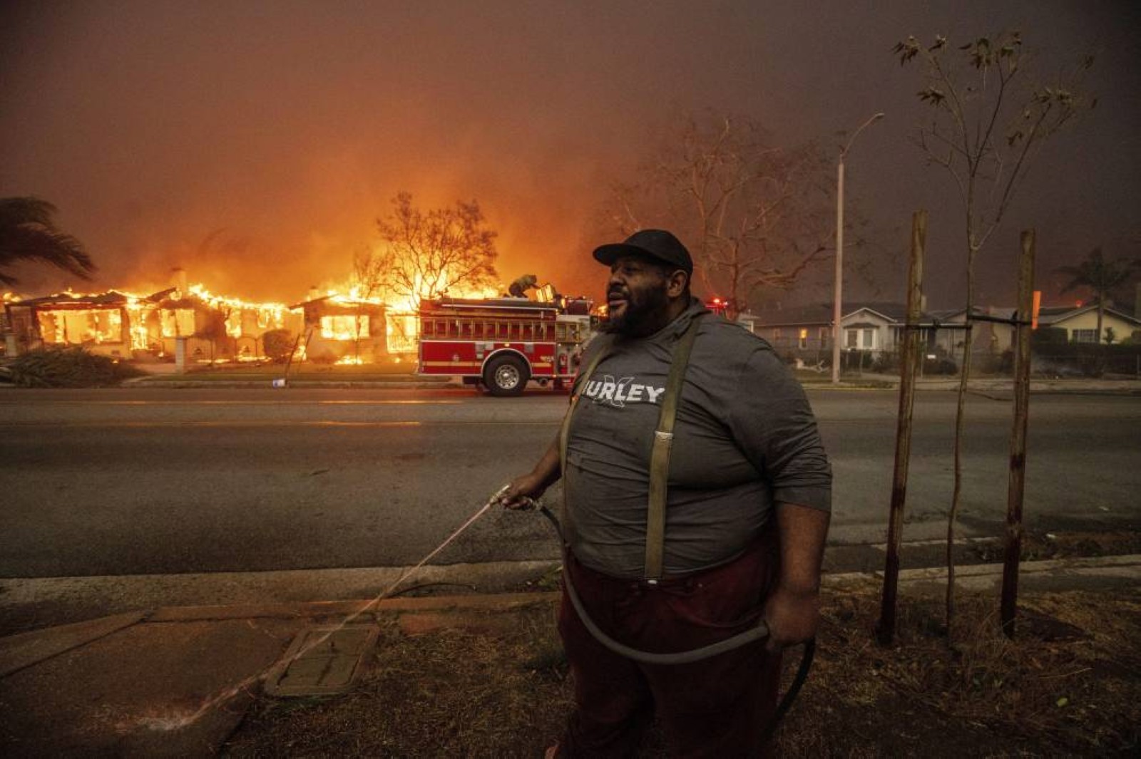 Firefighters race to beat Los Angeles blazes as winds grow; toll hits 16