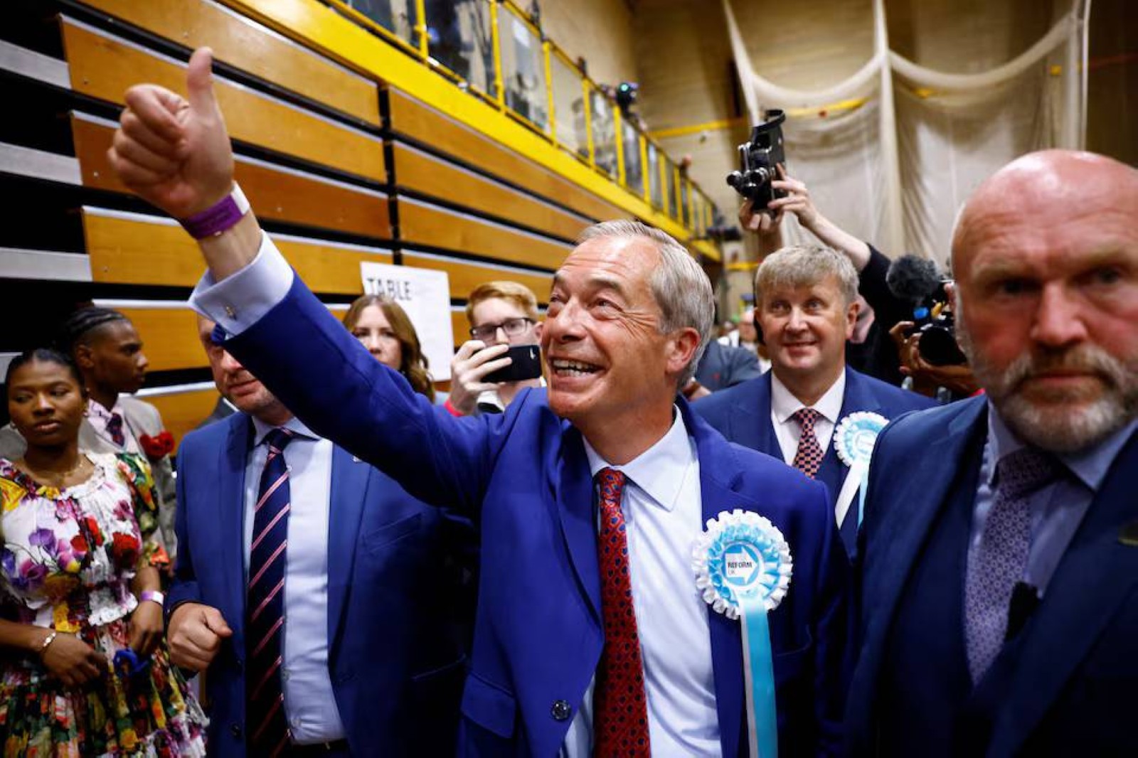 Nigel Farage gestures as he walks after winning his first seat in parliament during the UK election in Clacton-on-Sea, Britain.  File/Reuters