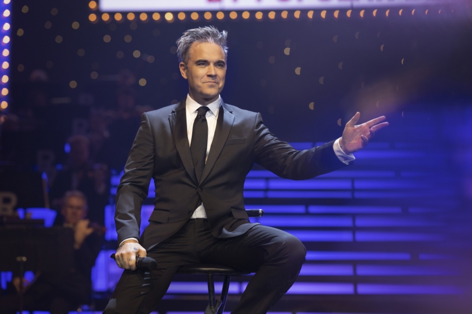Robbie Williams biopic connects even when monkeying around