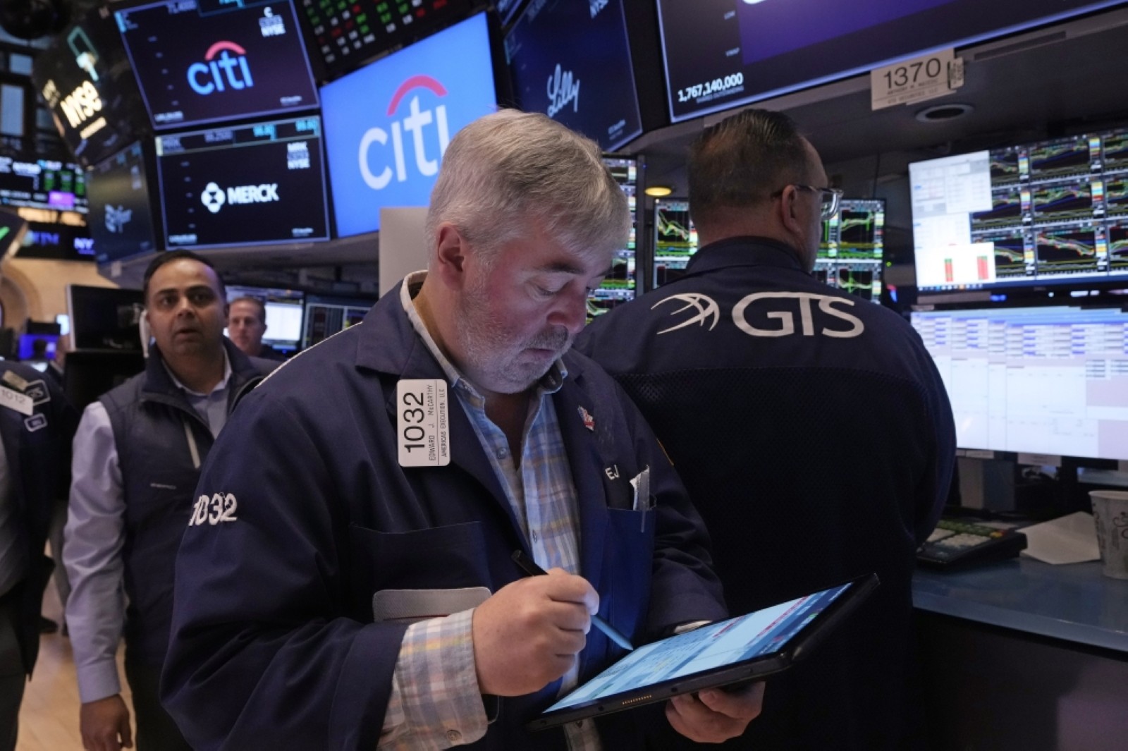 Traders work on the floor of the New York Stock Exchange on Wednesday.