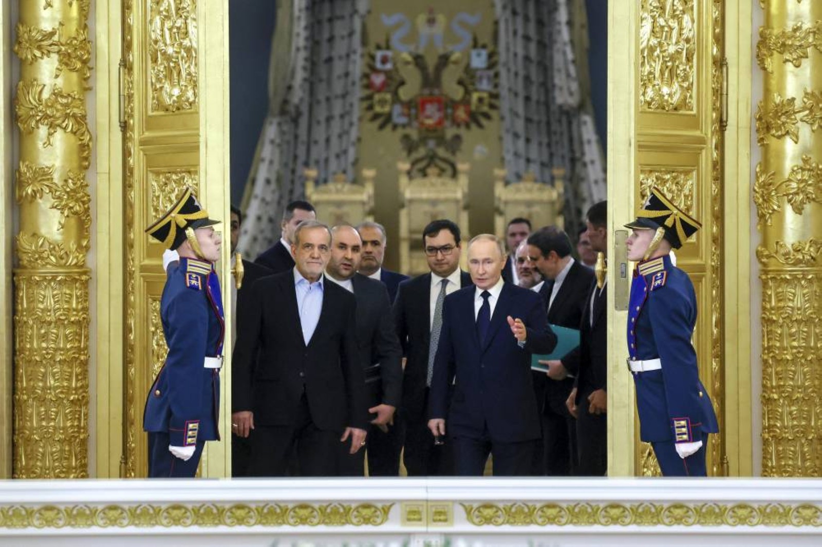 Putin and Iran's president deepen defence ties with 20-year pact