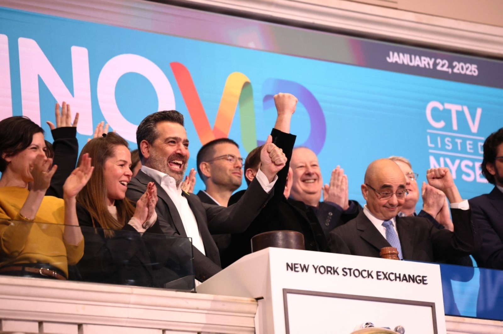 Top officials celebrate after ringing the opening bell at the New York Stock Exchange during morning trading on in New York on Wednesday.  Agence France-Presse