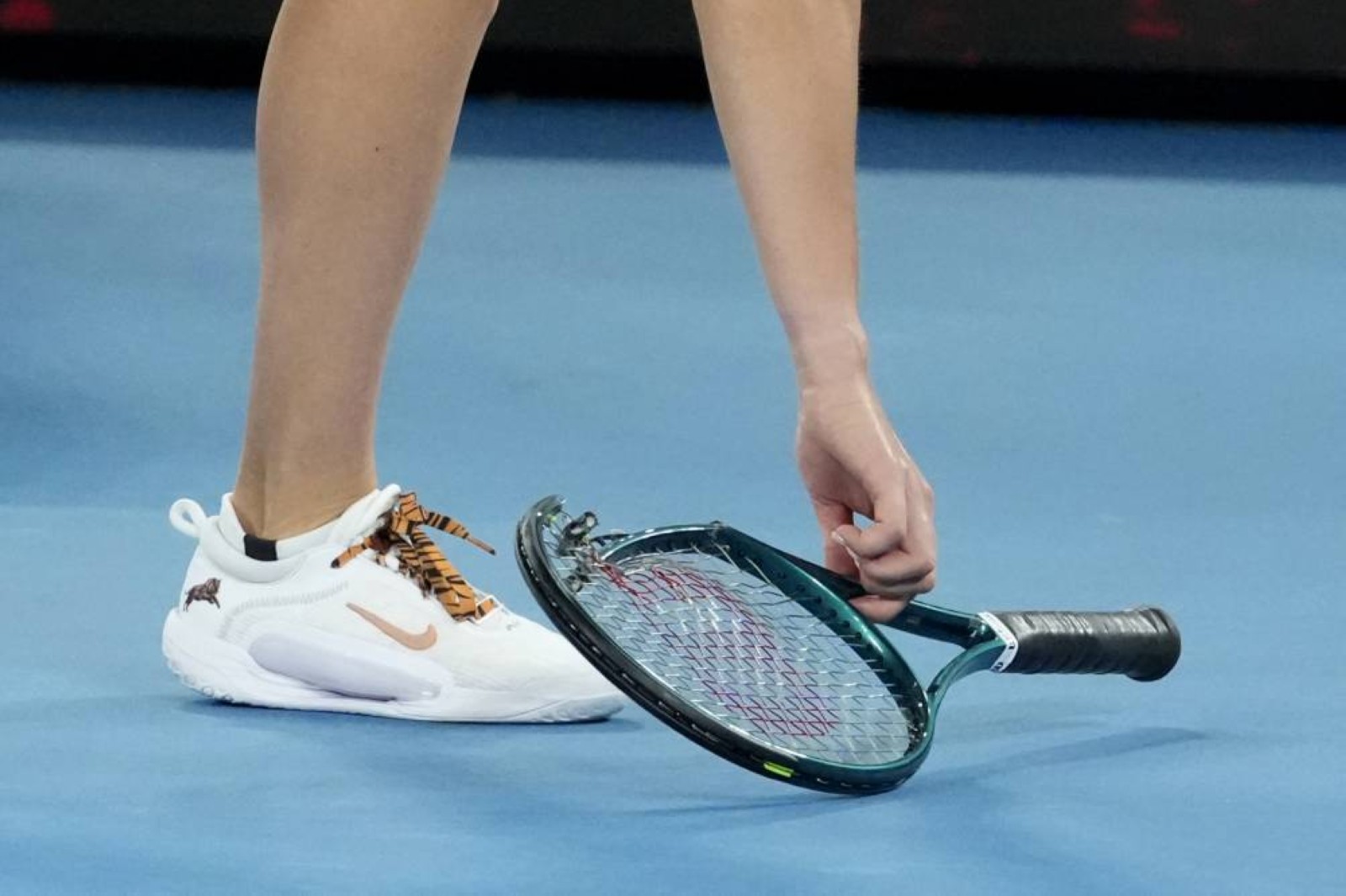 Aryna Sabalenka throws her racket after losing to Madison Keys in the final