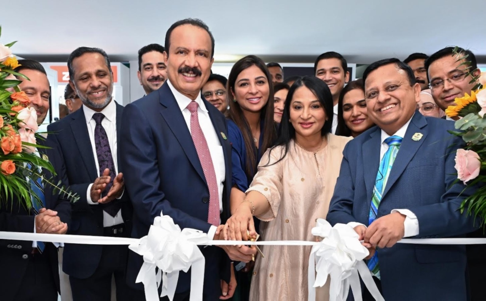Dr Azad Moopen with Alisha Moopen, Managing Director and Group CEO, Aster DM Healthcare GCC and other officials at the opening of the Aster Booth in Arab Health in Dubai on Monday.