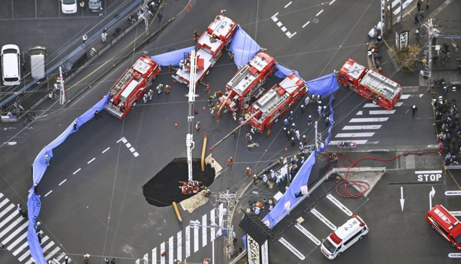 1.2 million in Japan told to use less water to help rescue man from sinkhole