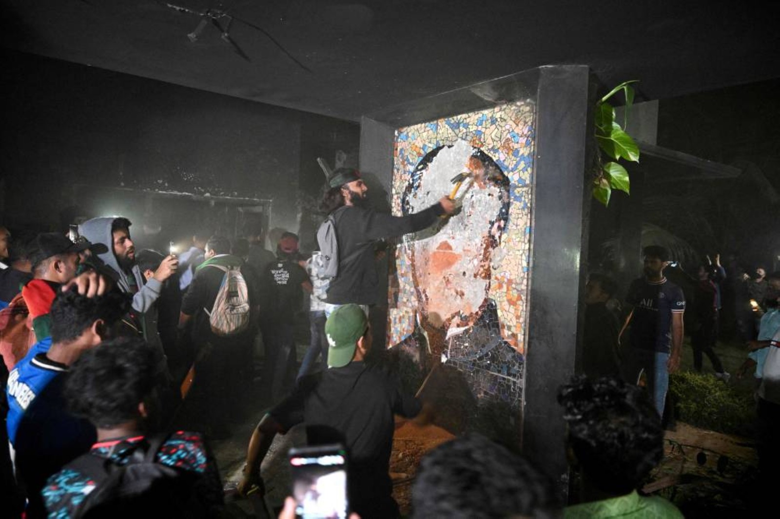 Bangladesh protesters torch and destroy ousted PM Hasina home