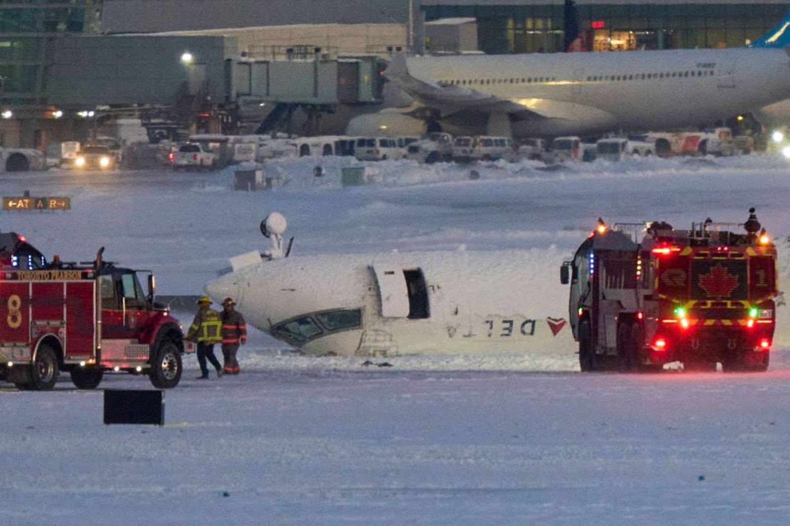 Delta plane flips upside down on landing at Toronto airport, 18 injured