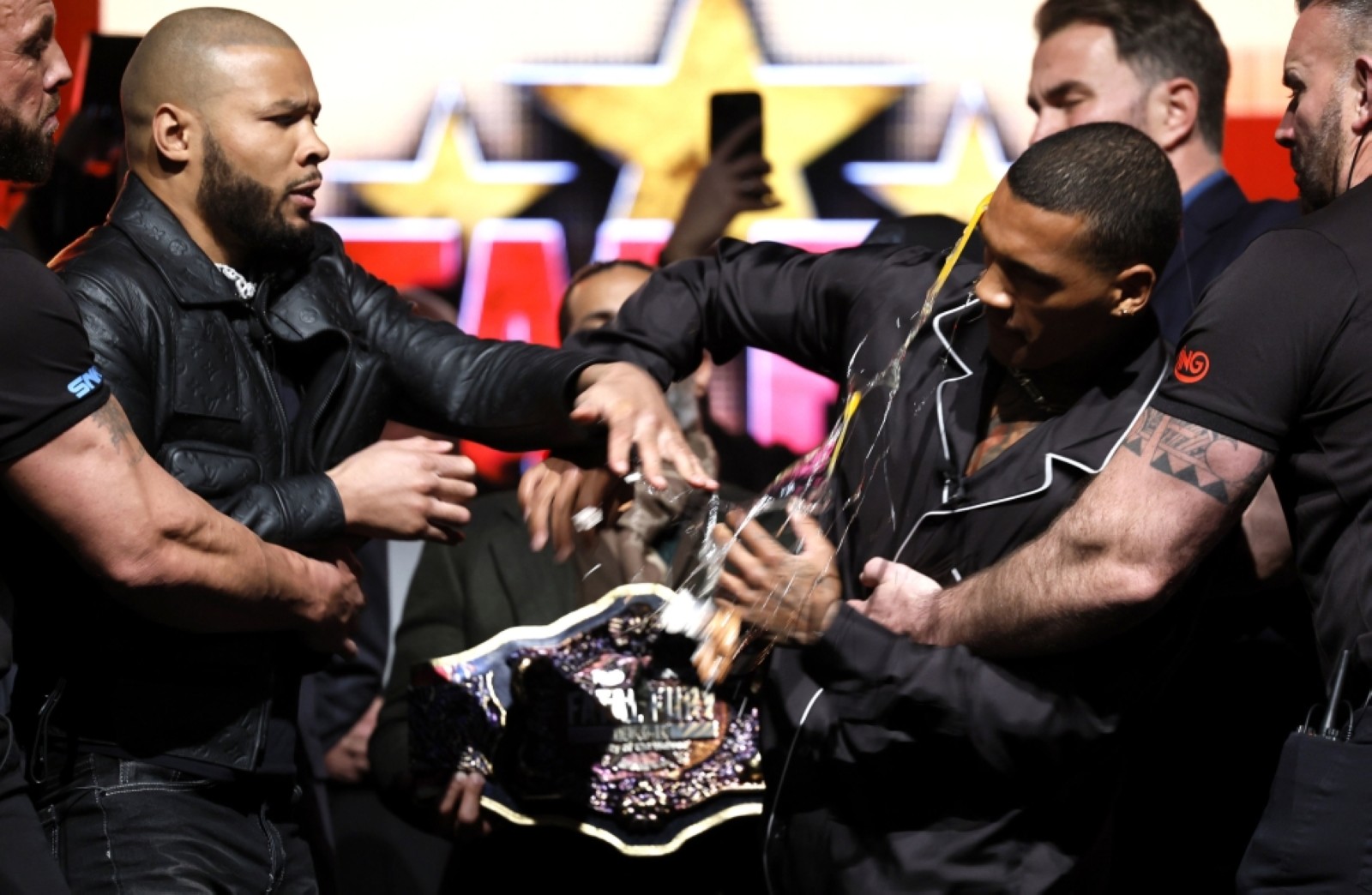 Eubank Jr. hits Benn in the face with egg at press event ahead of bout
