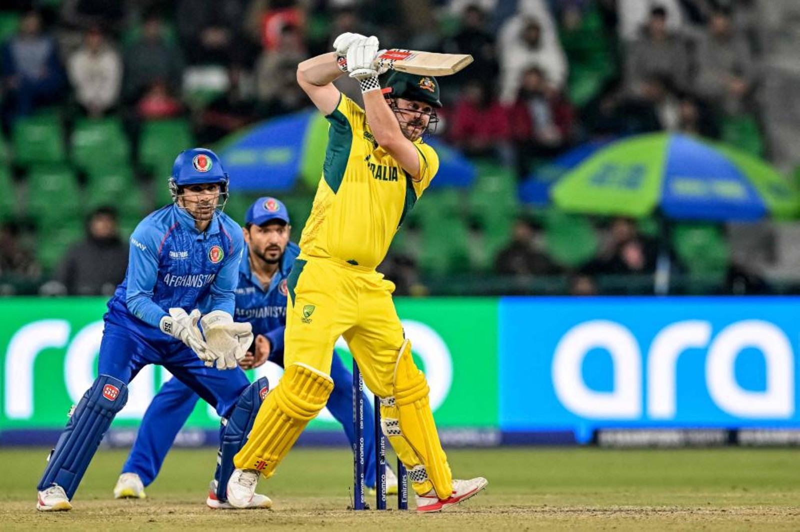Australia in Champions Trophy semis as rain hits Afghanistan's chances