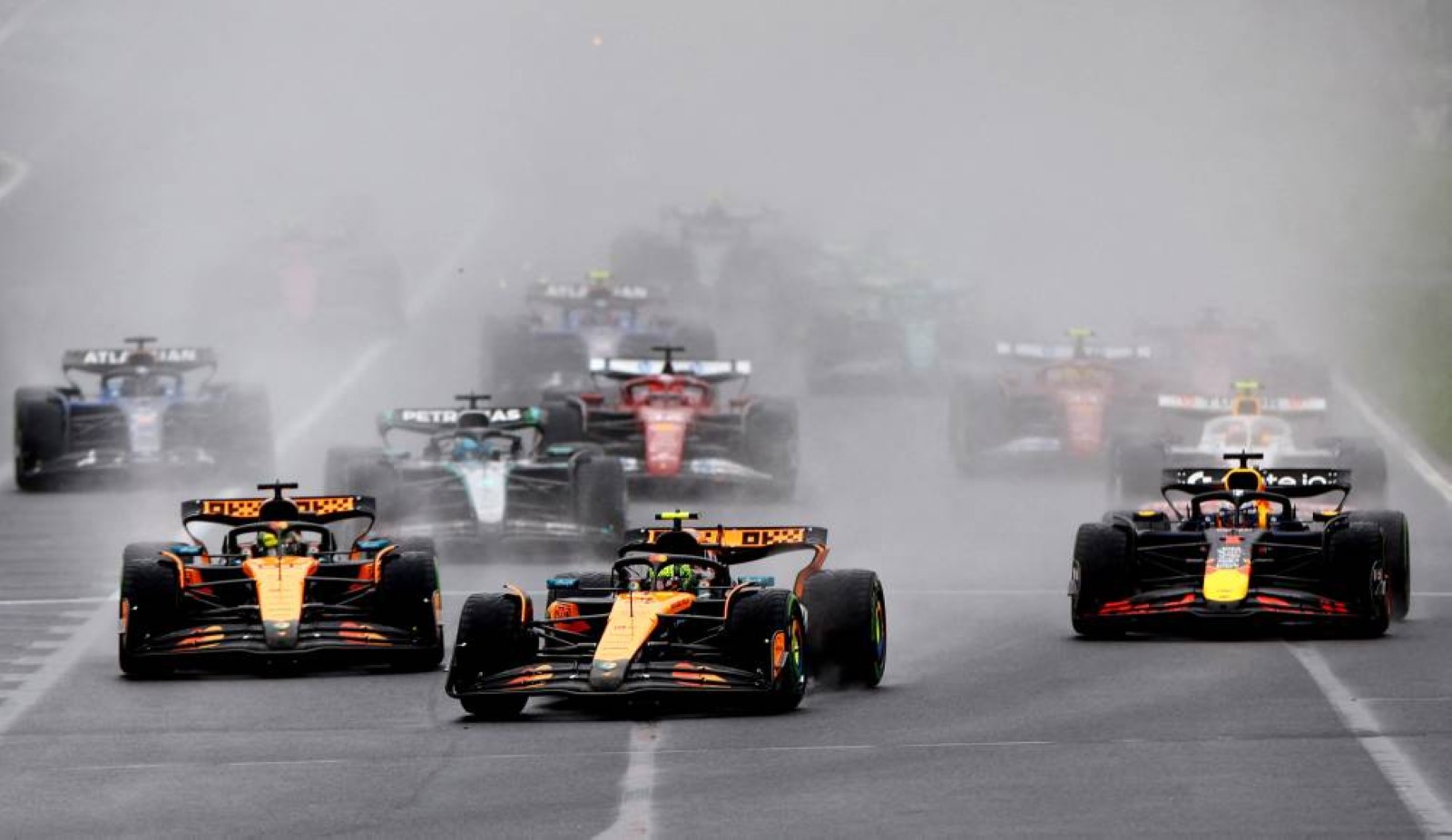 Norris holds off Verstappen to win wild F1 opener in Australia