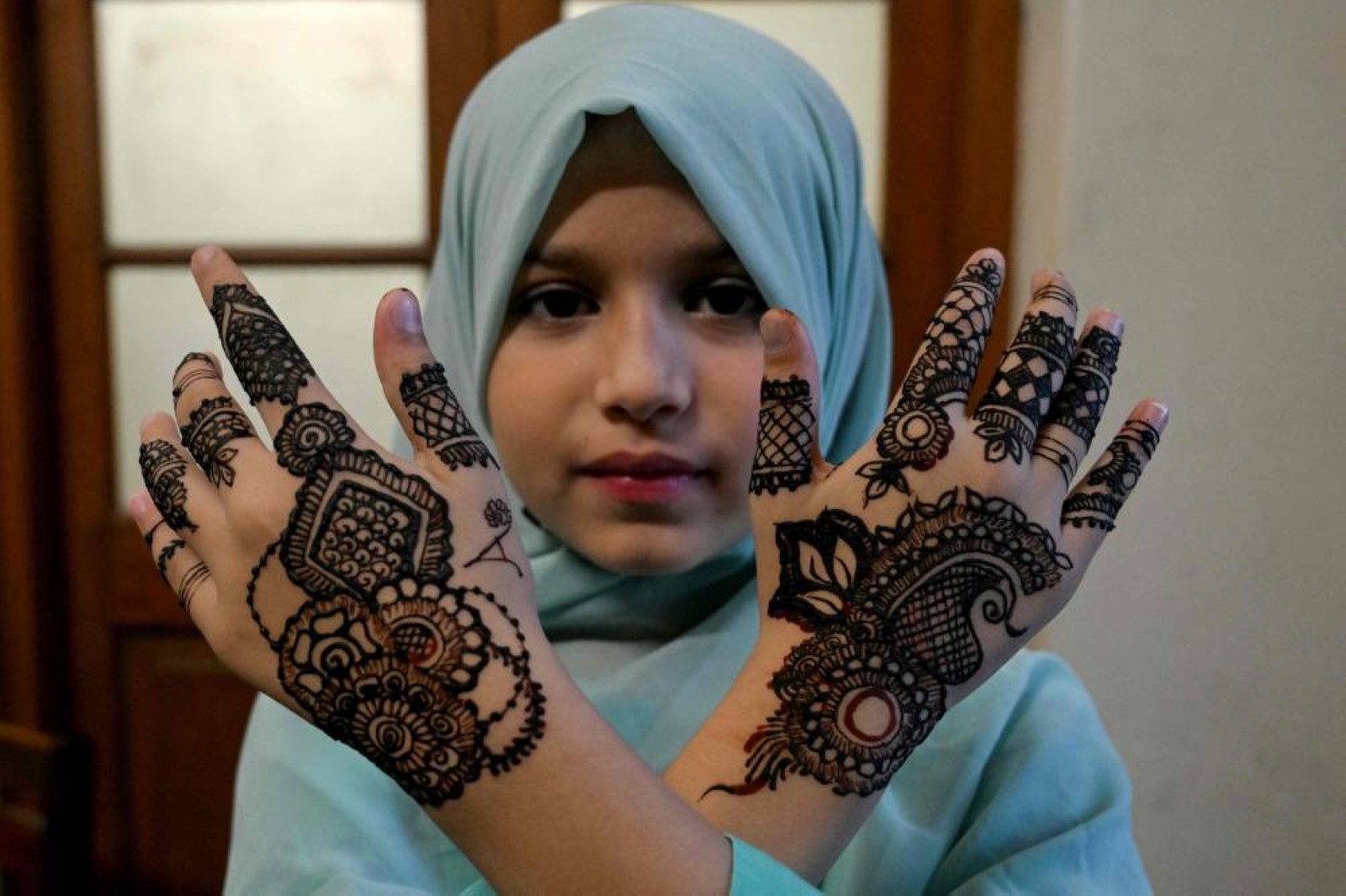 What is Eid Al Fitr and how do Muslims celebrate the Islamic holiday?