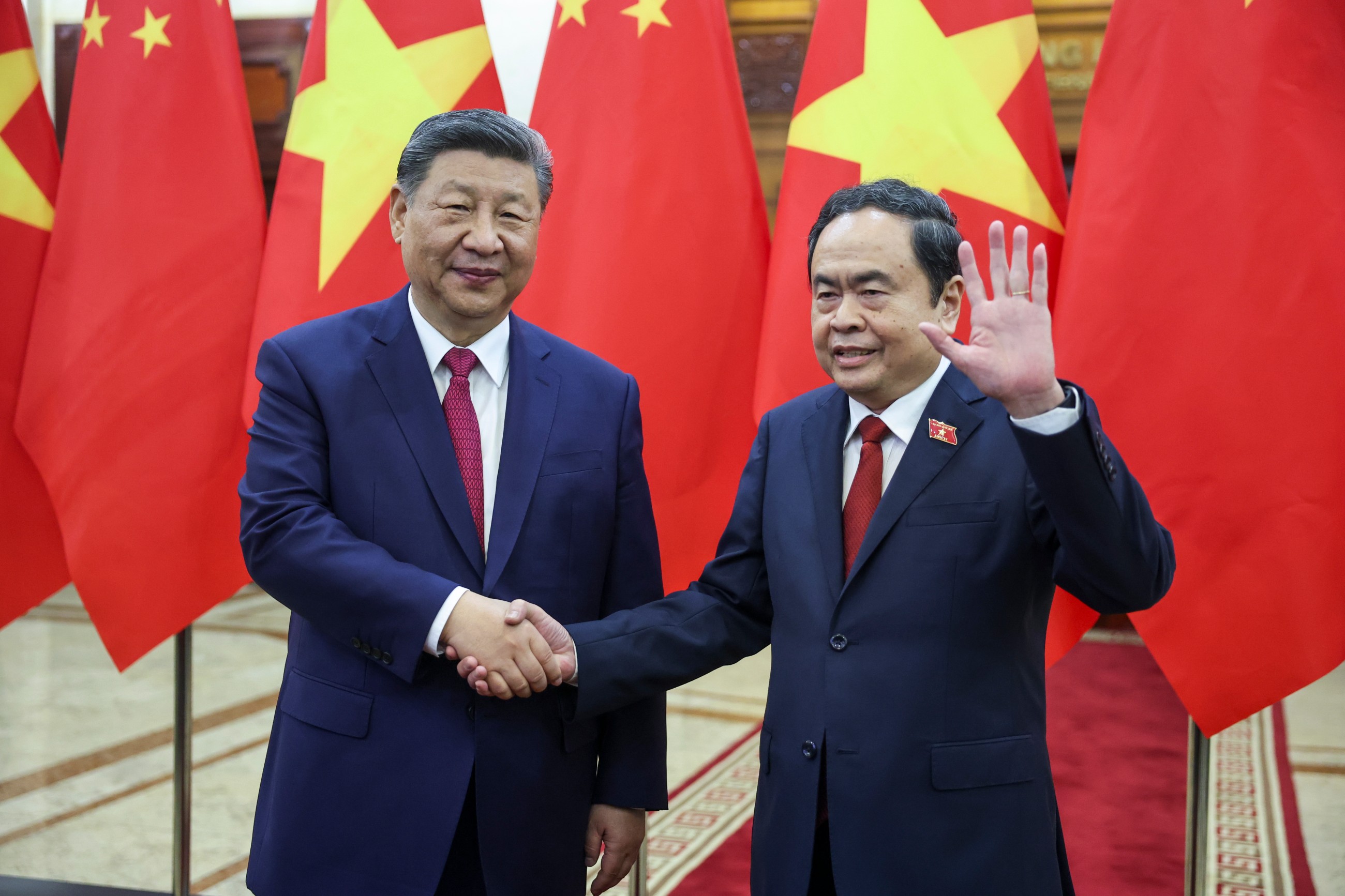 China, Vietnam sign deals as Xi visits Hanoi amid US tariff woes