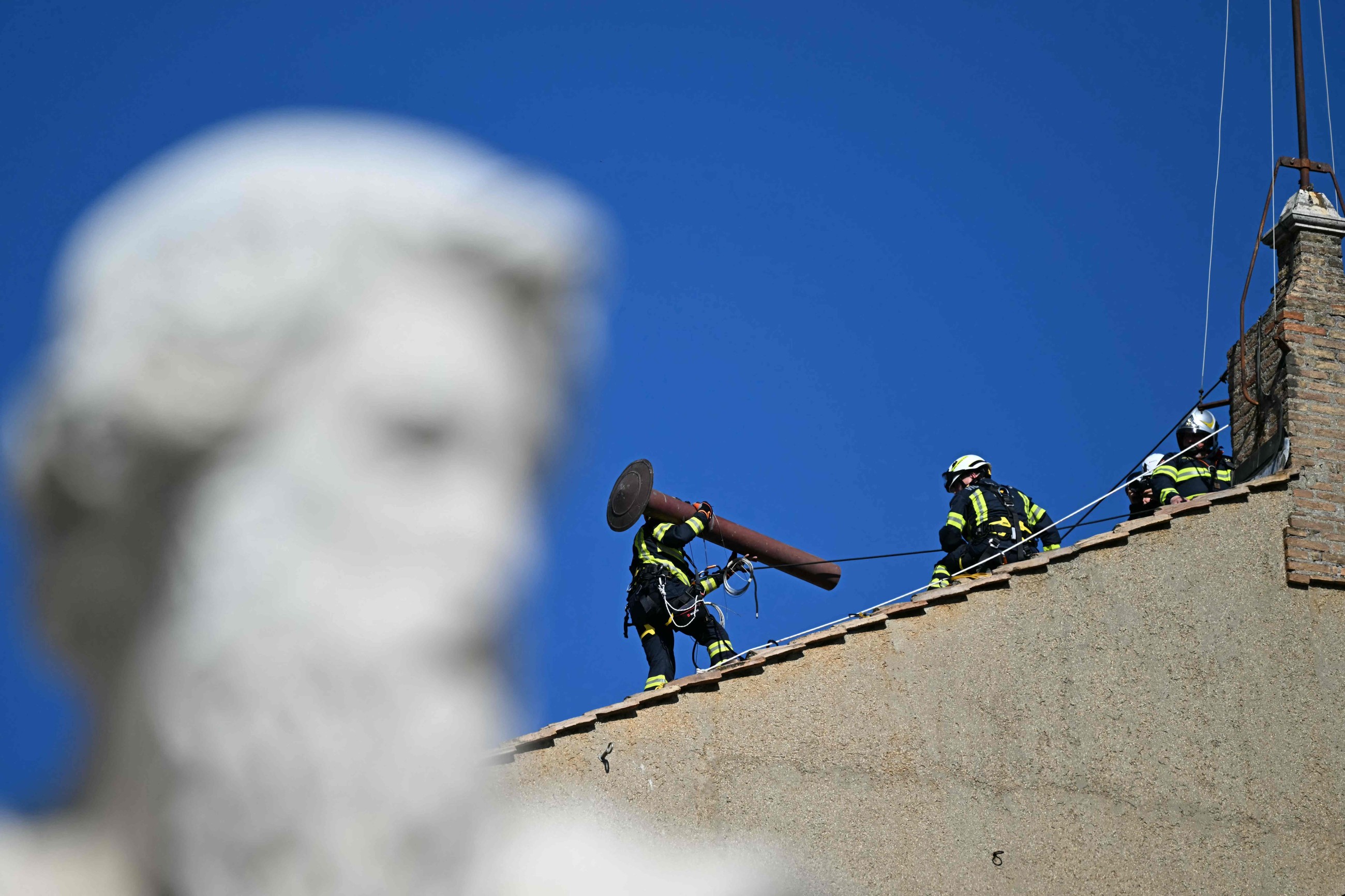 Vatican installs chimney on roof of Sistine Chapel for papal election