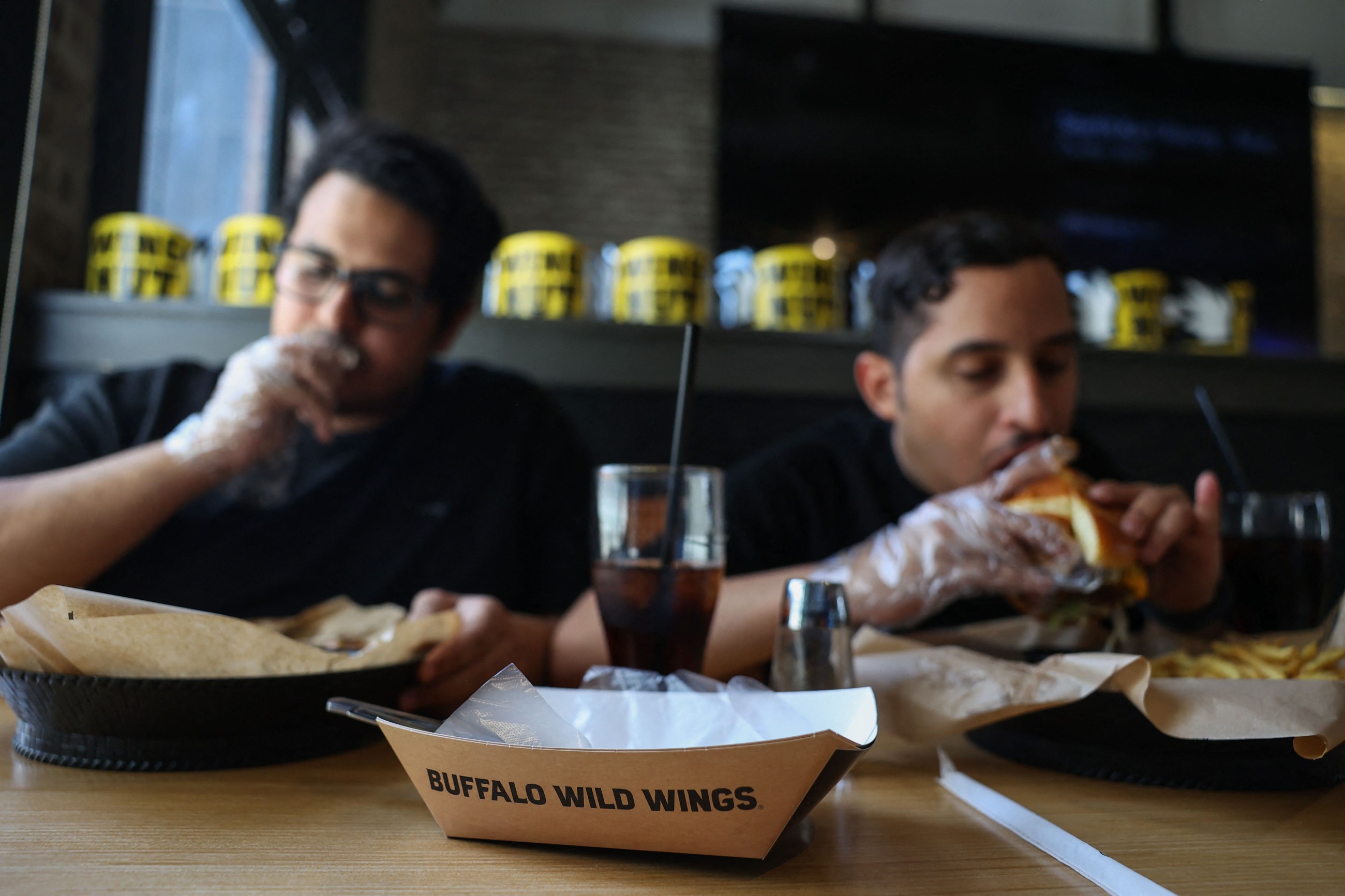 Chicken wings, donuts, SUVs: Saudis simply love American food, cars, movies