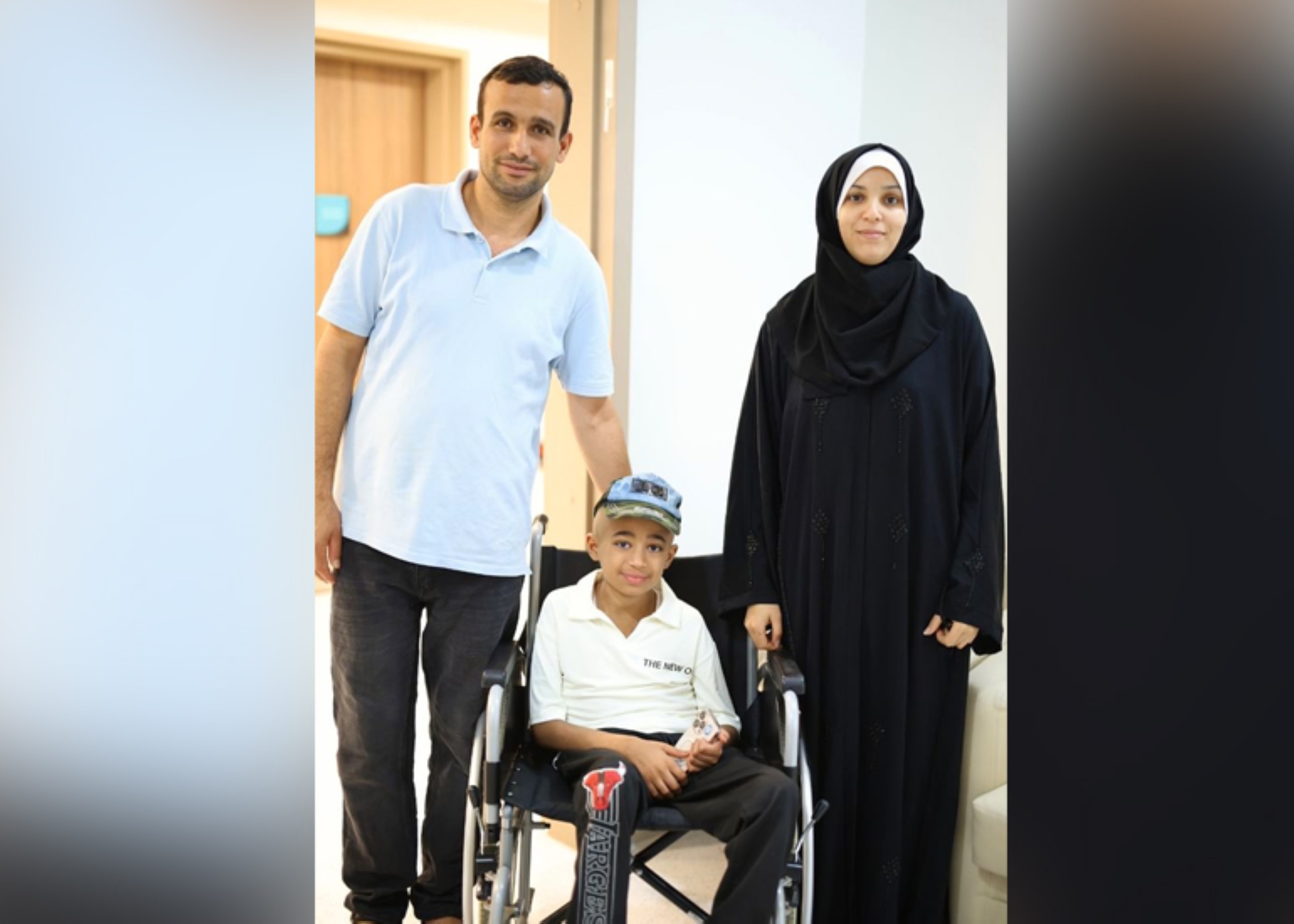 The Palestinian child poses with his family members at Yas Clinic in Khalifa City, Abu Dhabi. WAM