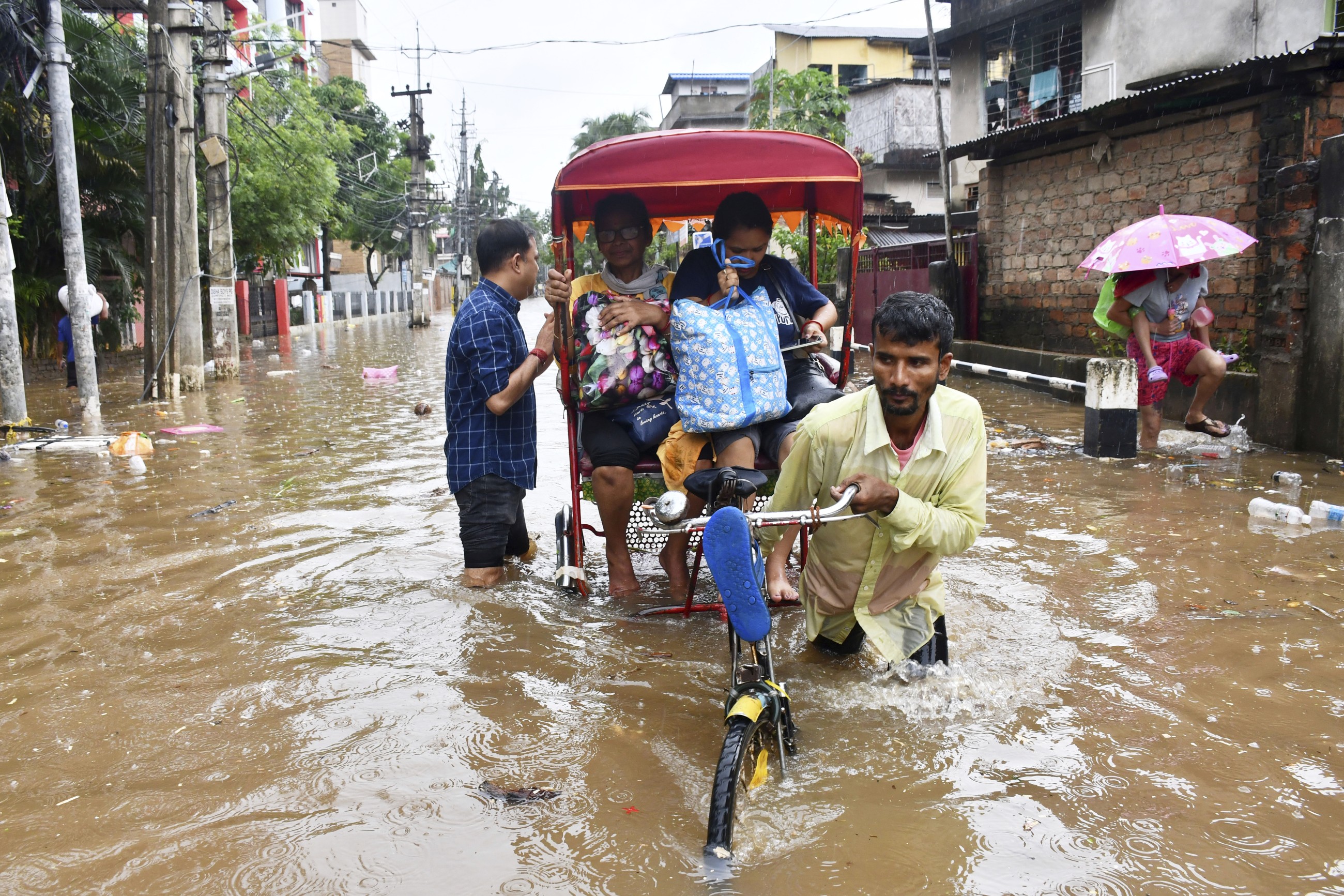 Monsoon rain, floods kill at least 22 in India's northeast