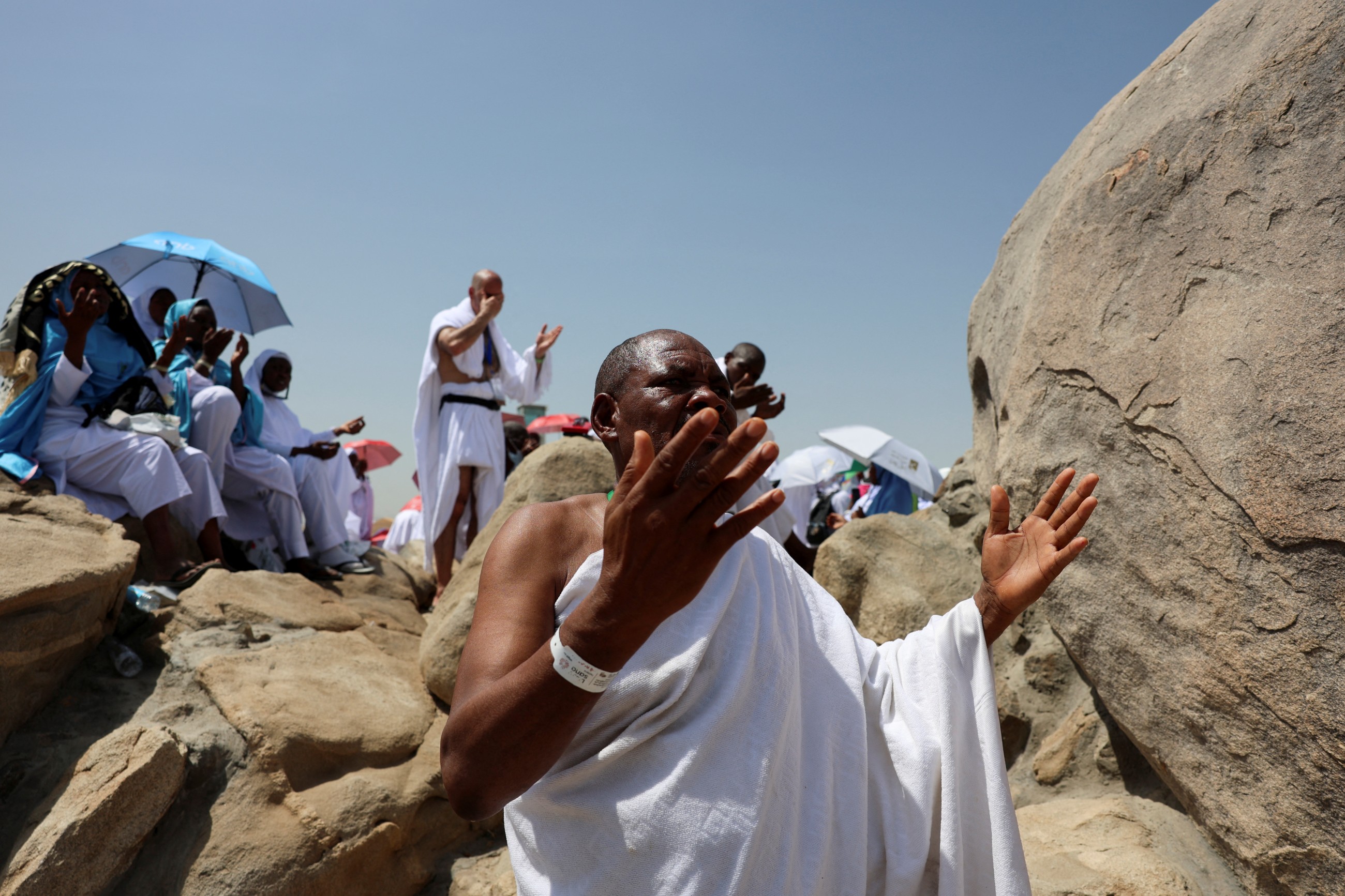 Pilgrims seek forgiveness and shade on Mount Arafat during key Hajj ritual