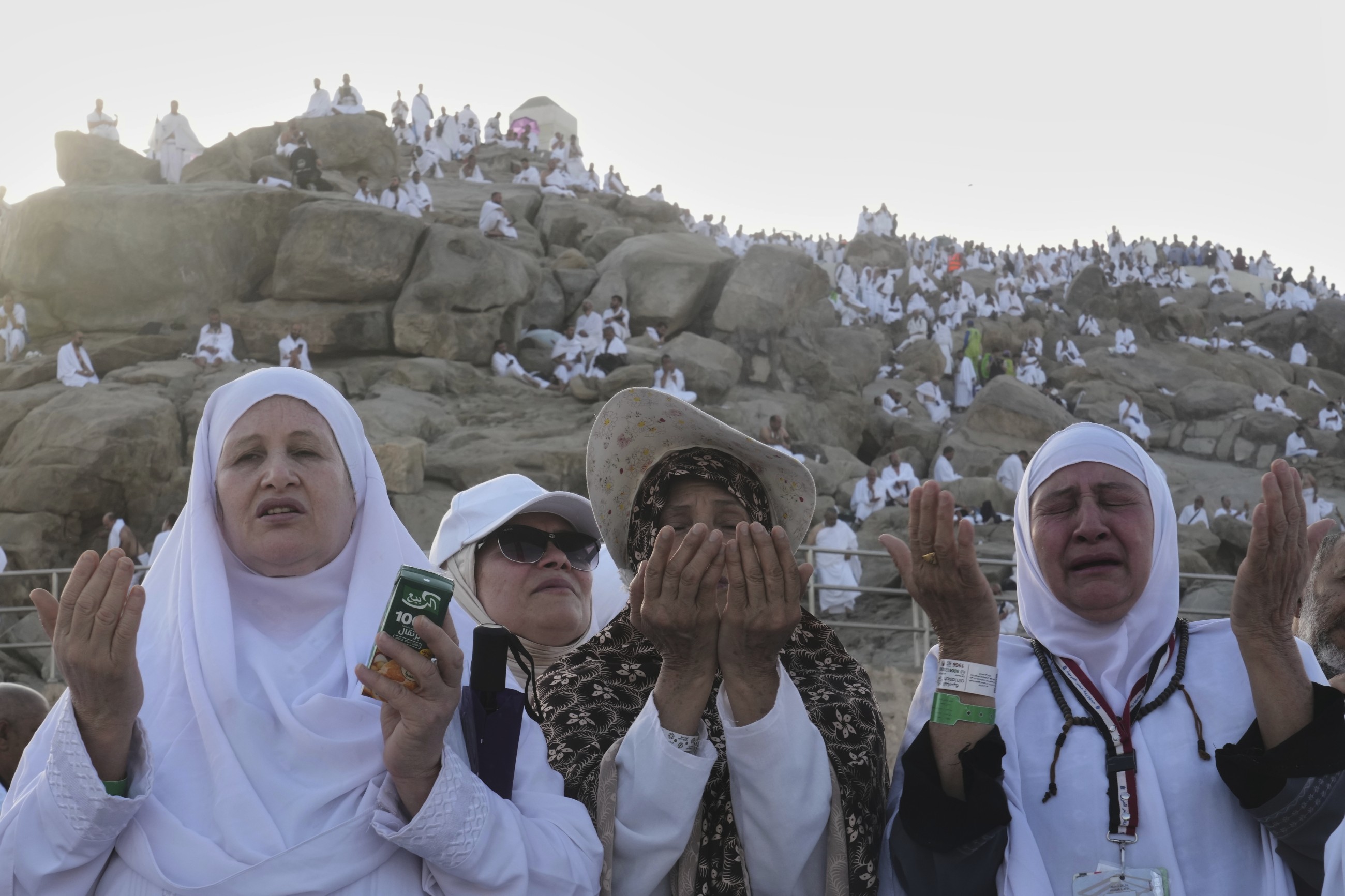 Pilgrims seek forgiveness and shade on Mount Arafat during key Hajj ritual