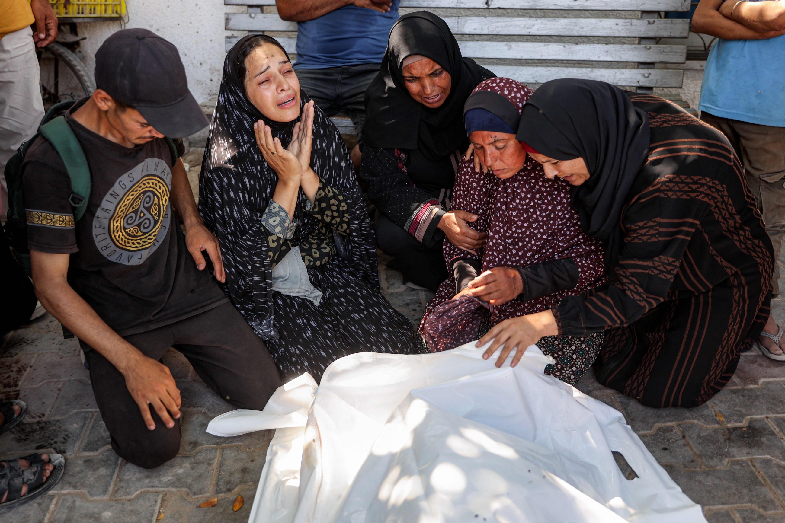 Israeli fire kills 35 more Palestinians in Gaza, many at aid site: Medics
