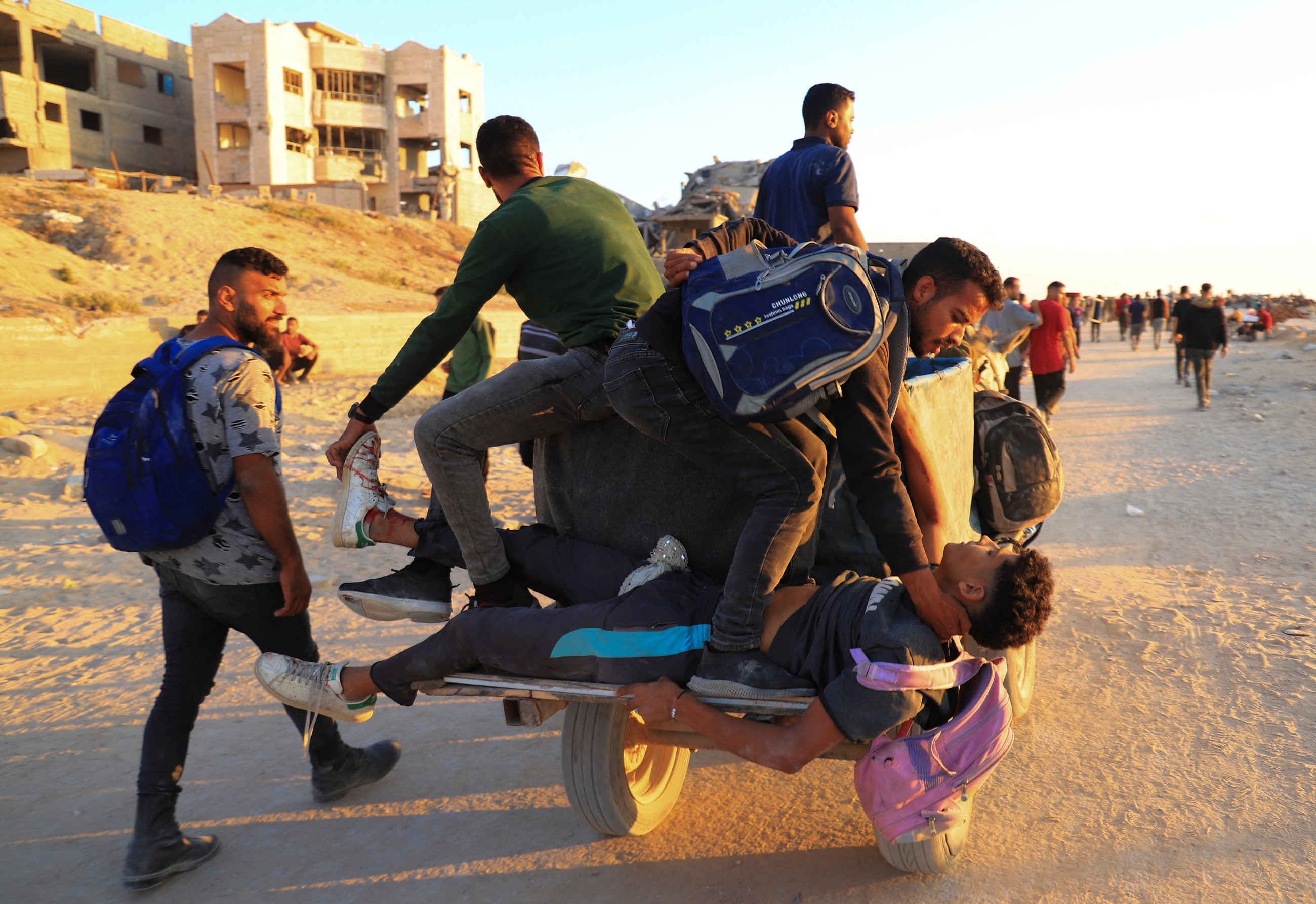 As death toll rises, Gazans make life-risking journeys to seek food