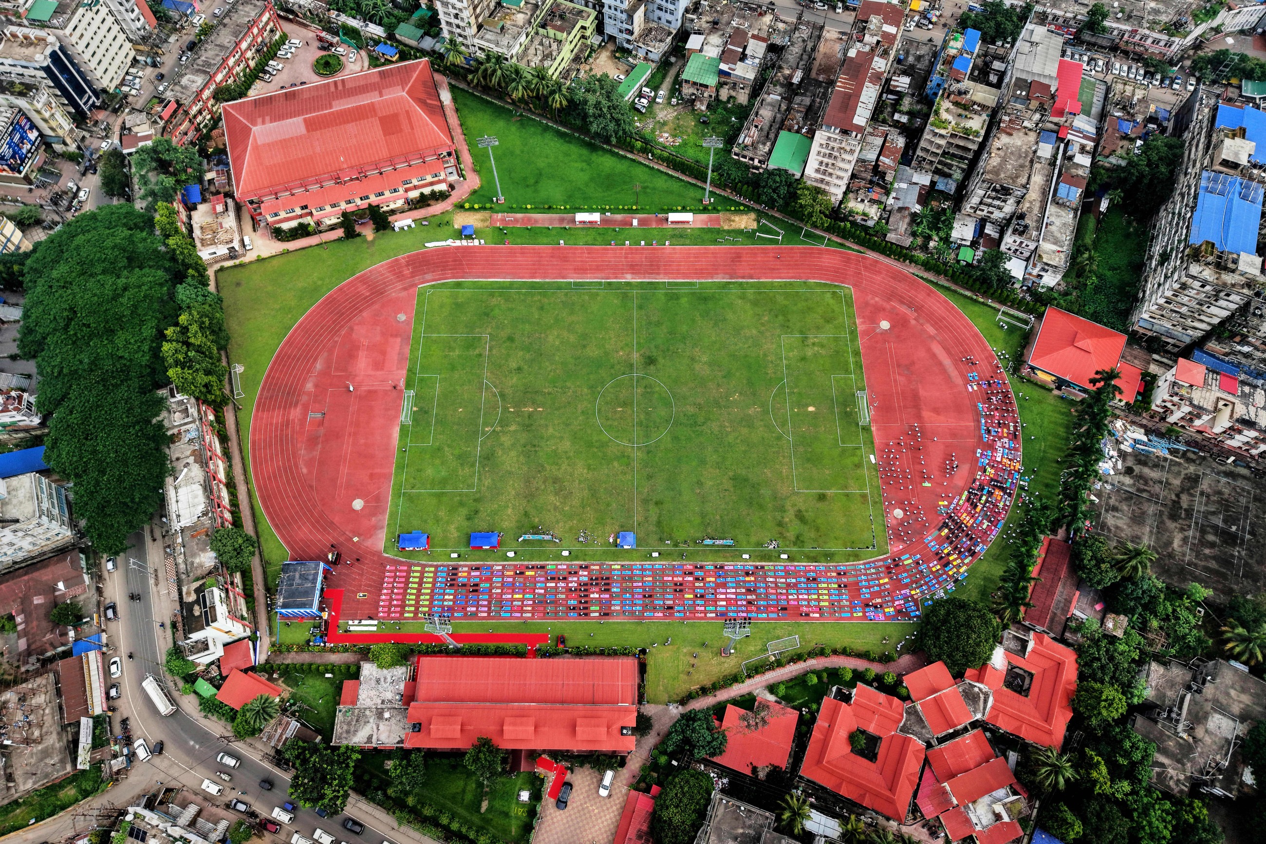 Tens of thousands of enthusiasts stretch, breathe and balance to mark International Day of Yoga
