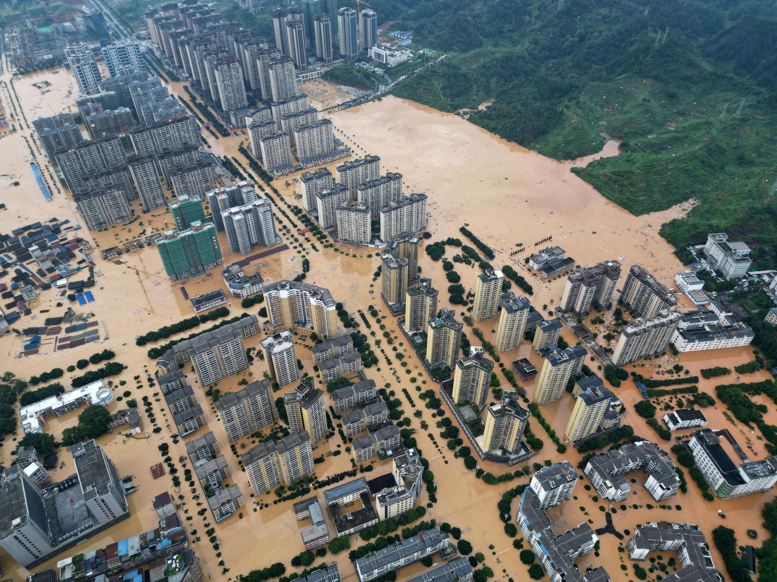 Massive floods force tens of thousands to evacuate in China