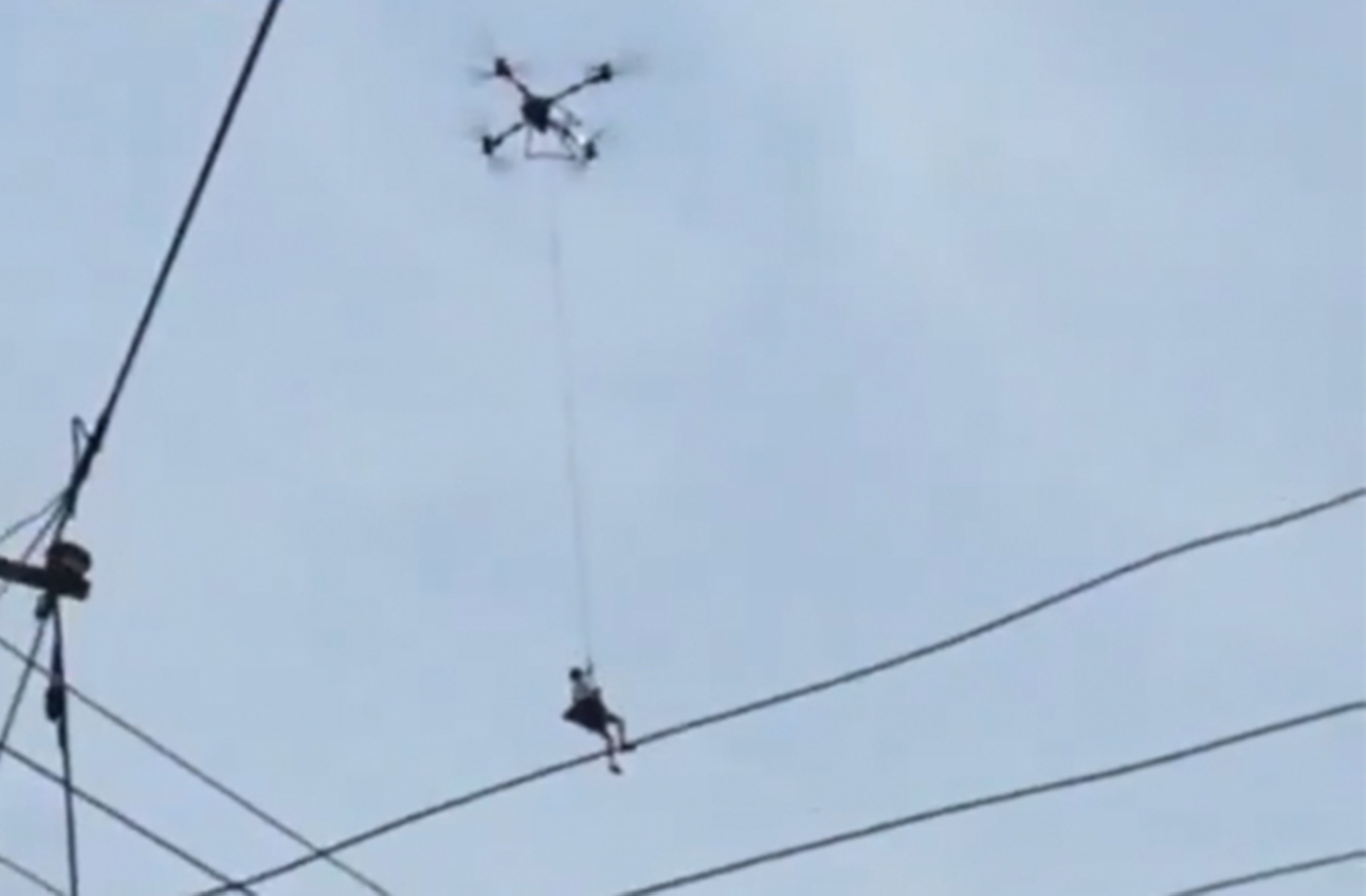 VIDEO: A heavy‑lift drone rescues a man trapped in floodwaters in China’s Guangxi