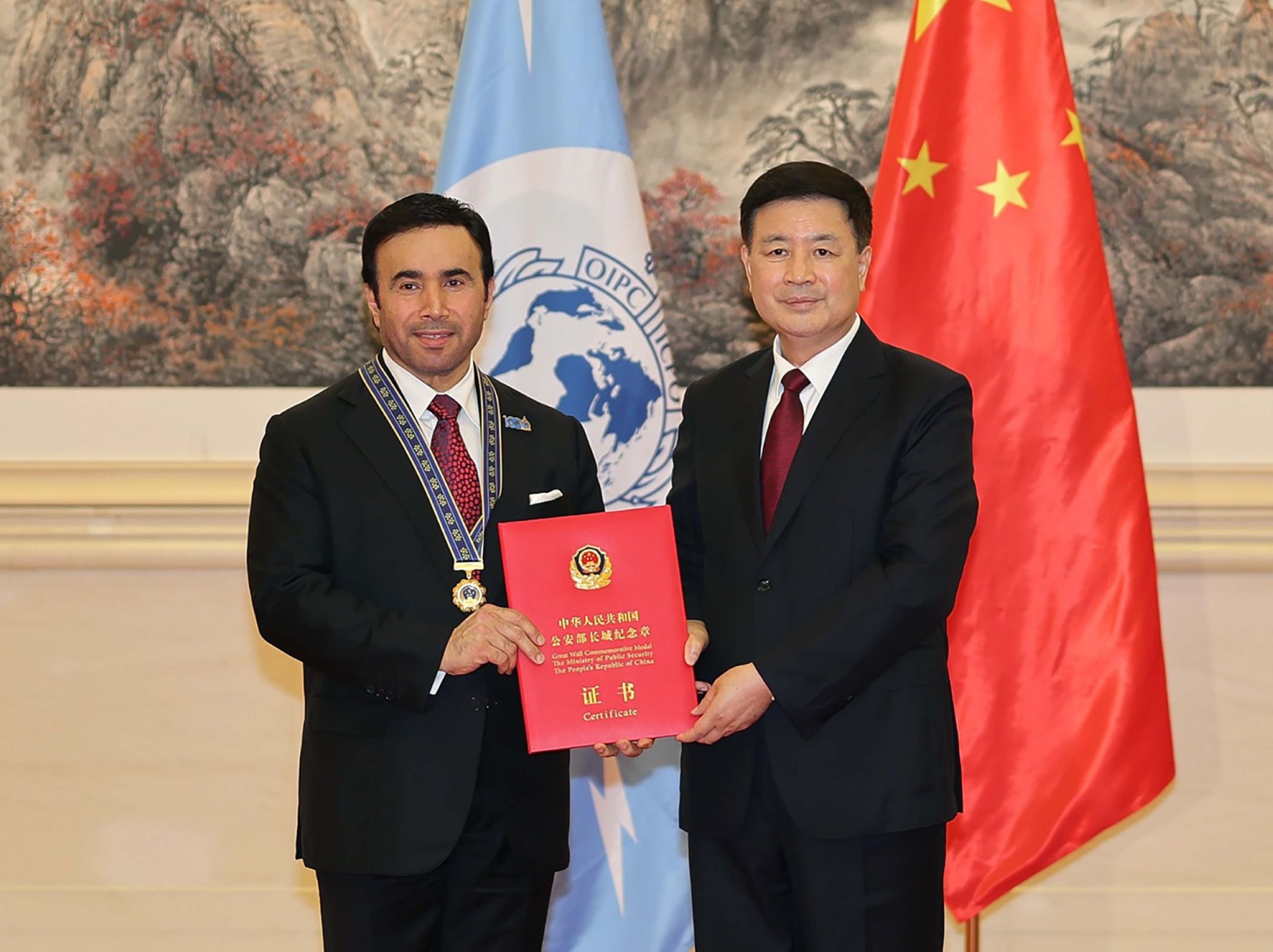 China honours Interpol chief with highest security honour