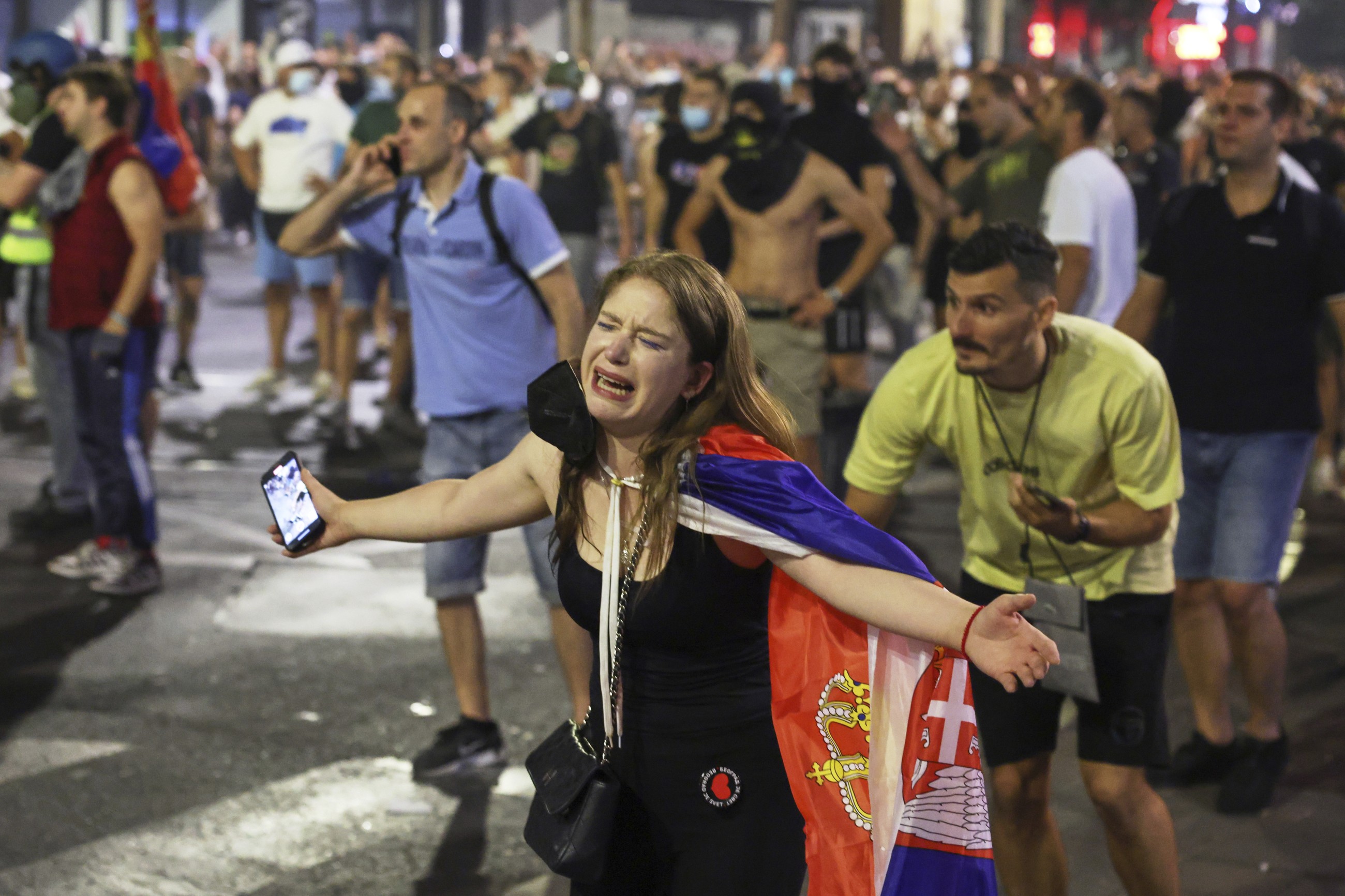 Serbian president digs in, slams early polls rally