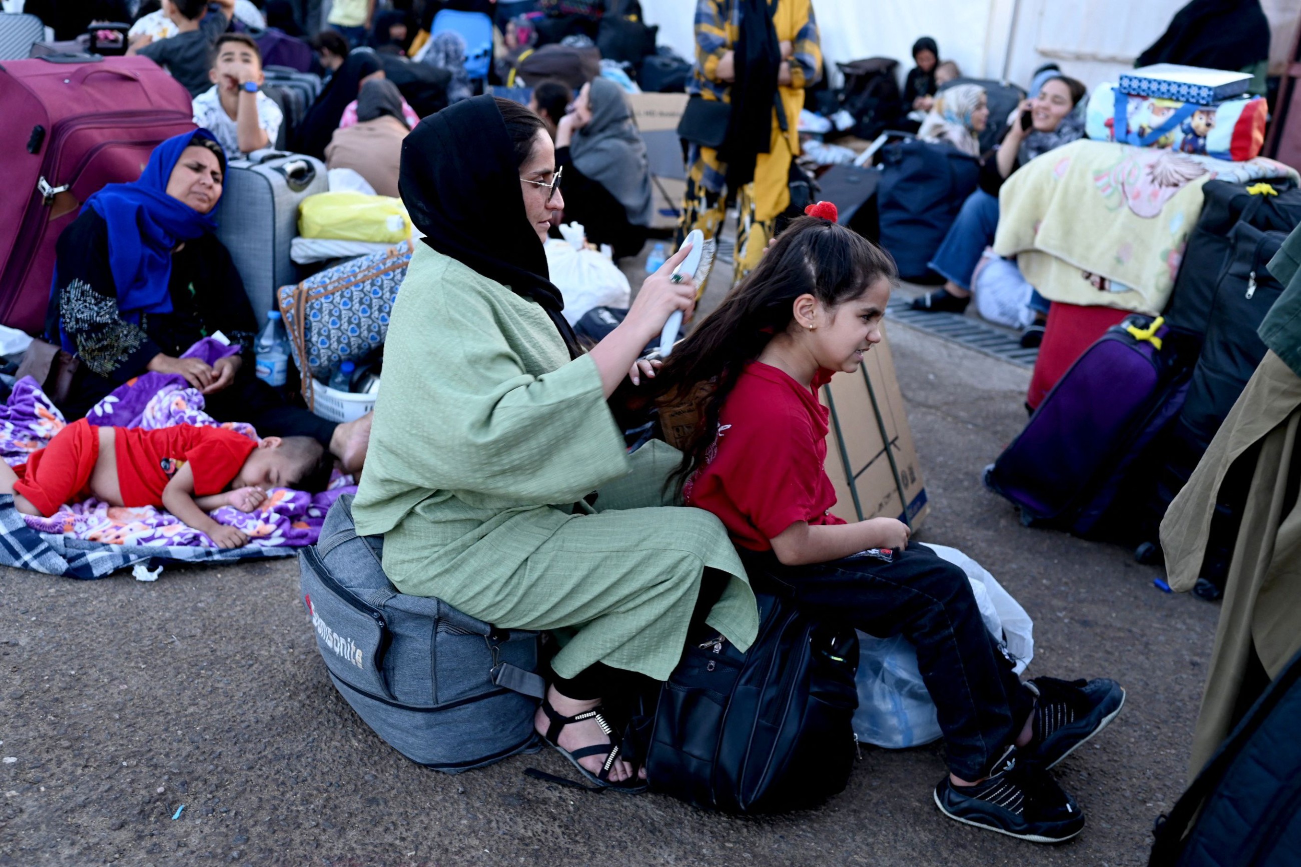 Nearly 700,000 Afghans driven out of Iran return to uncertain future