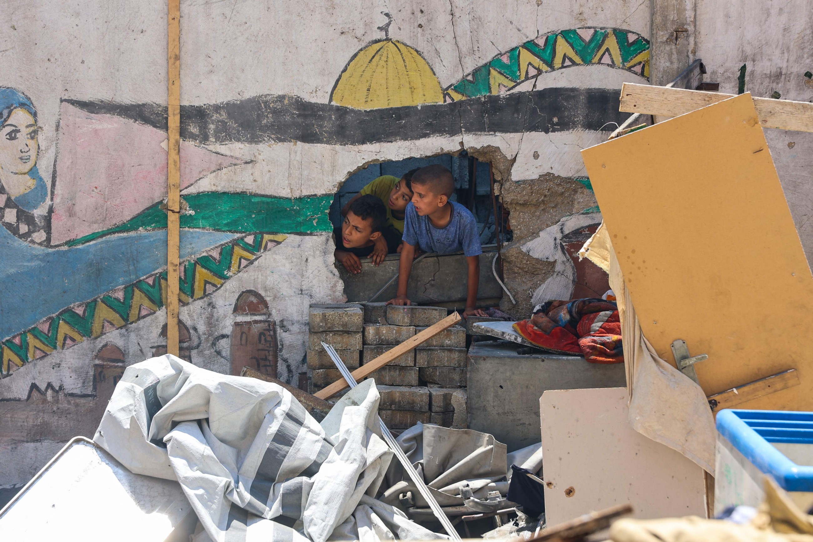 'This is not life:' Gazans reel from Israeli strike on school-turned-shelter