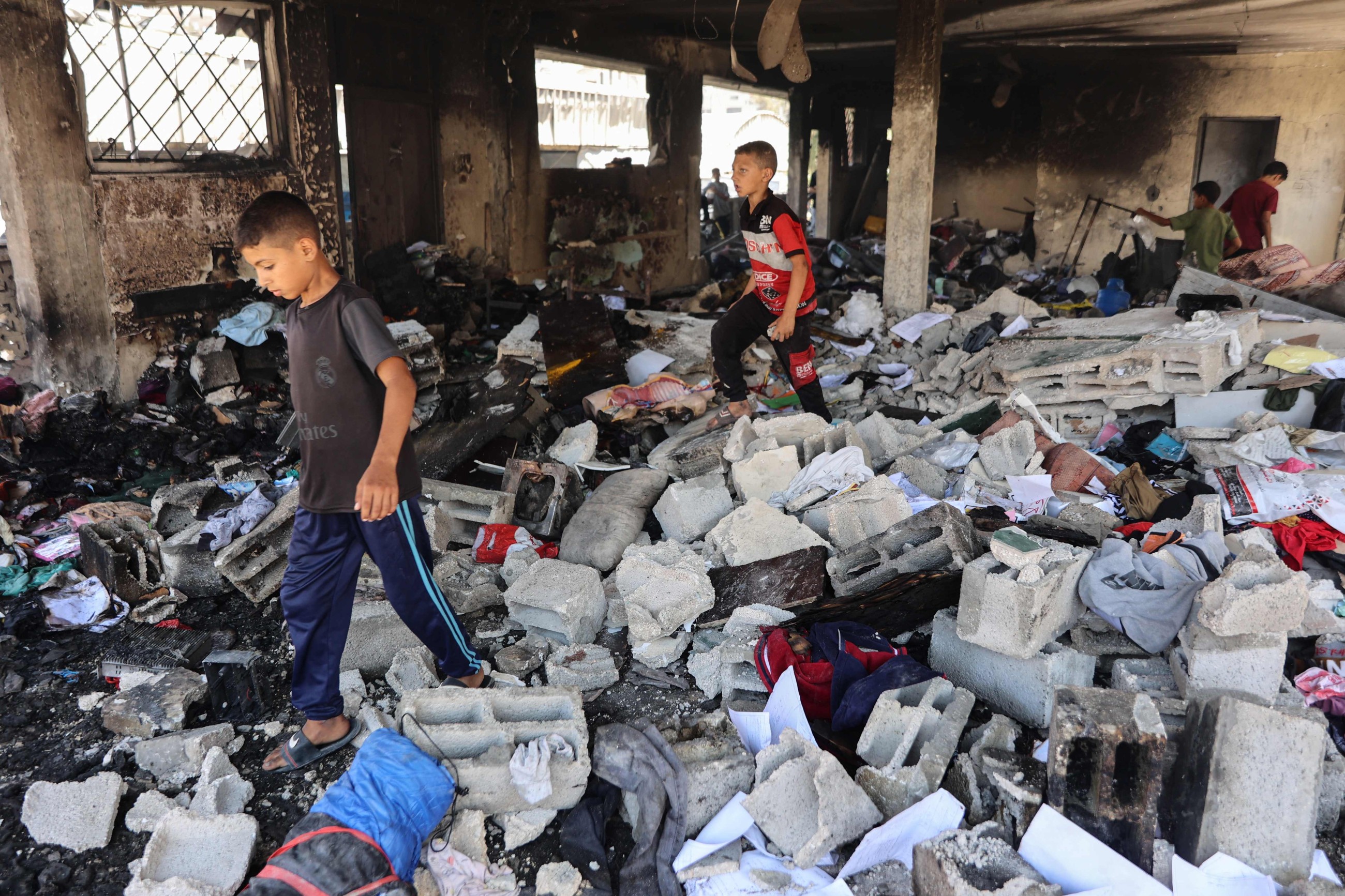 'This is not life:' Gazans reel from Israeli strike on school-turned-shelter