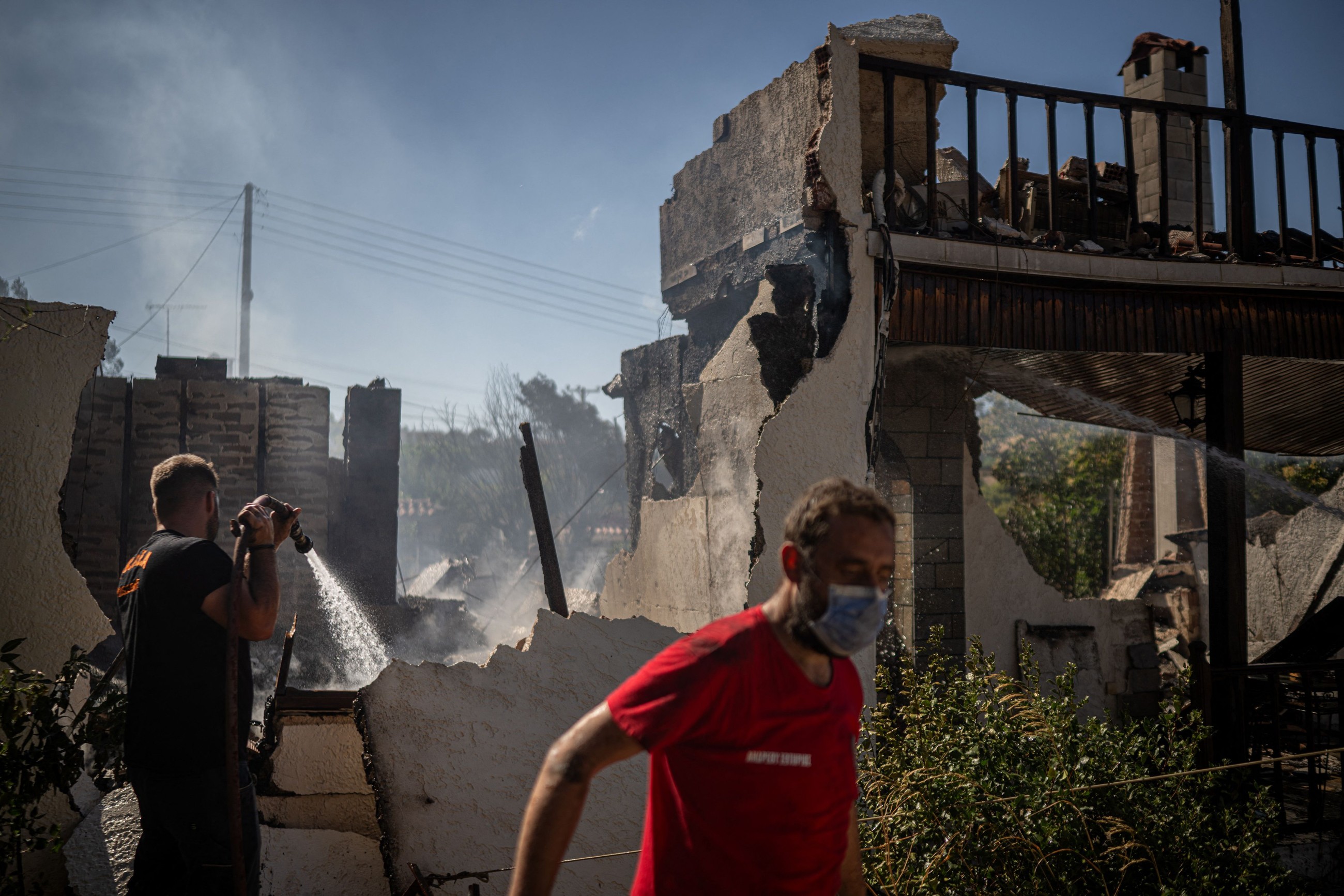 Greece battles wildfire for a third day as temperatures rise