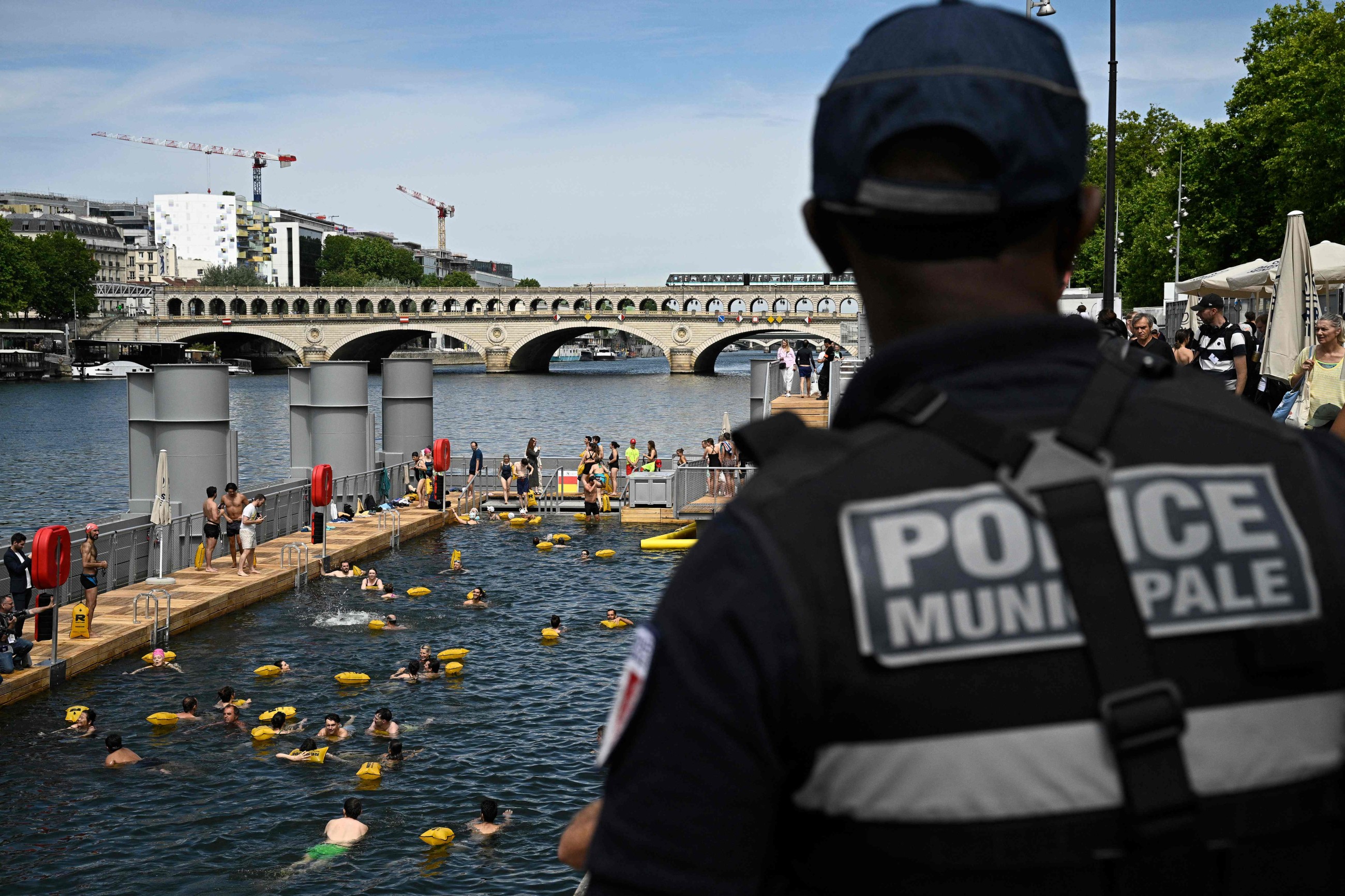 Happy swimmers cool off in Paris' Seine river after 100-year ban lifted