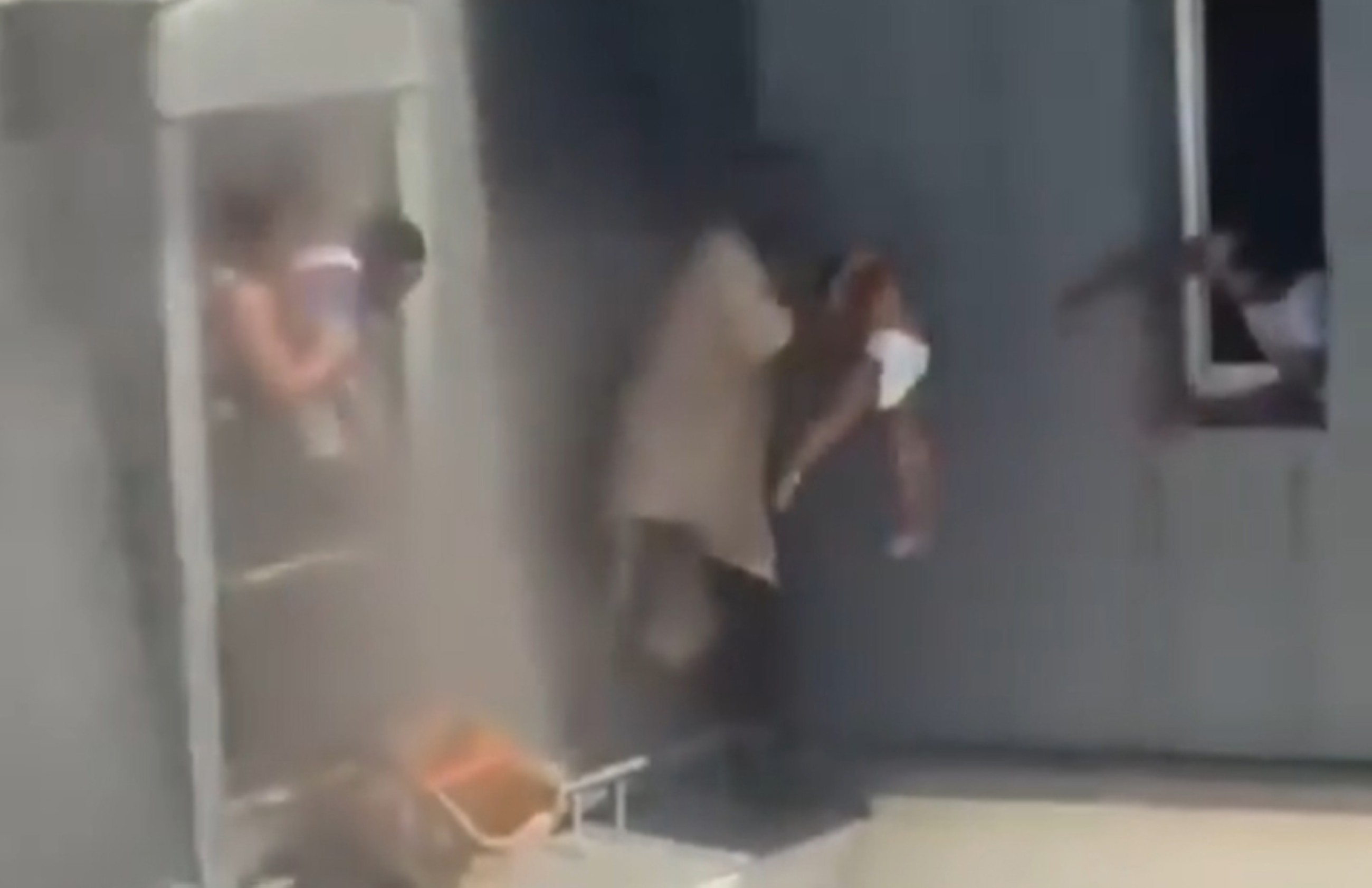 VIDEO: African man risking his life saves a family from a building fire in Paris