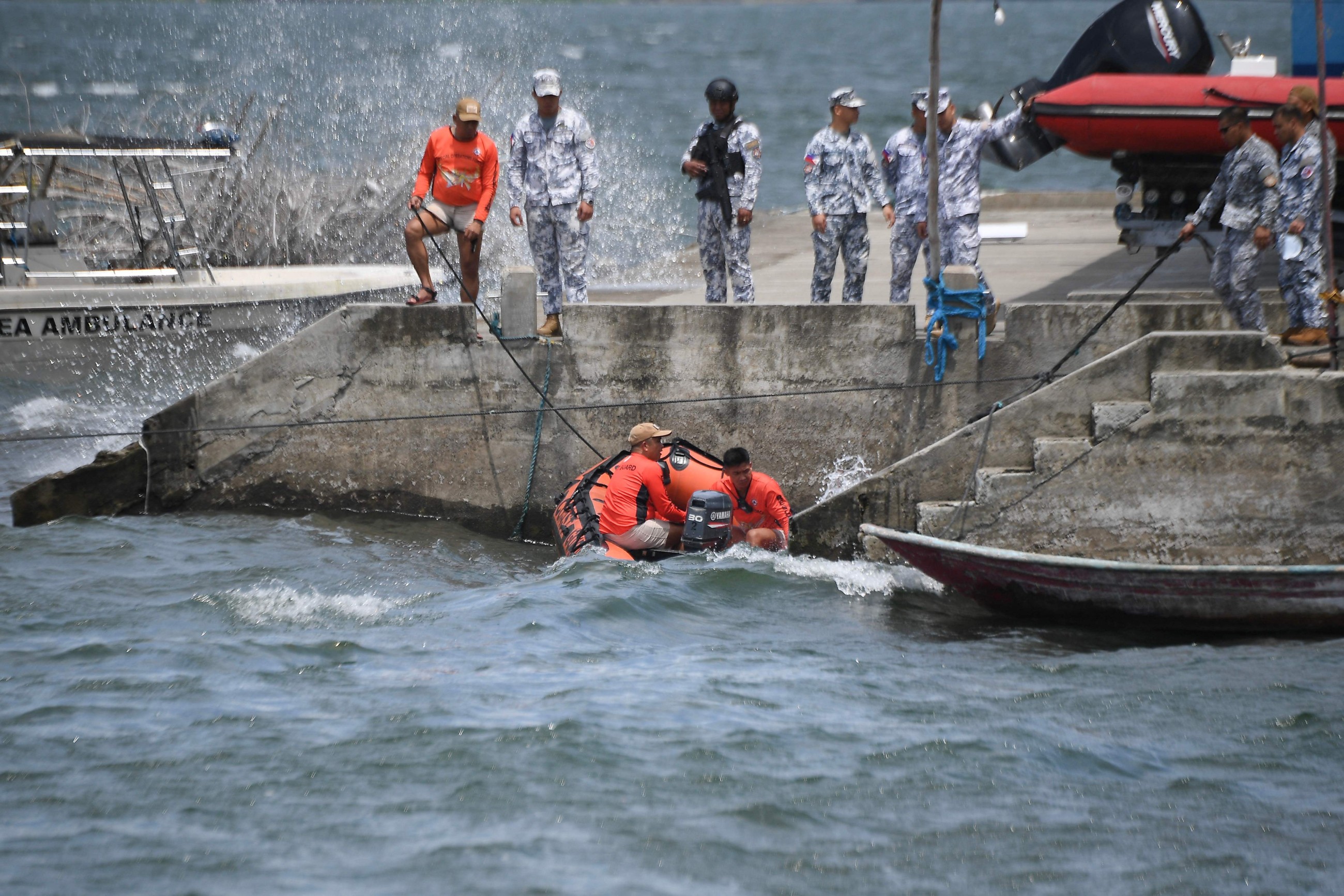 Search for missing cockfighters begins at Philippine lake