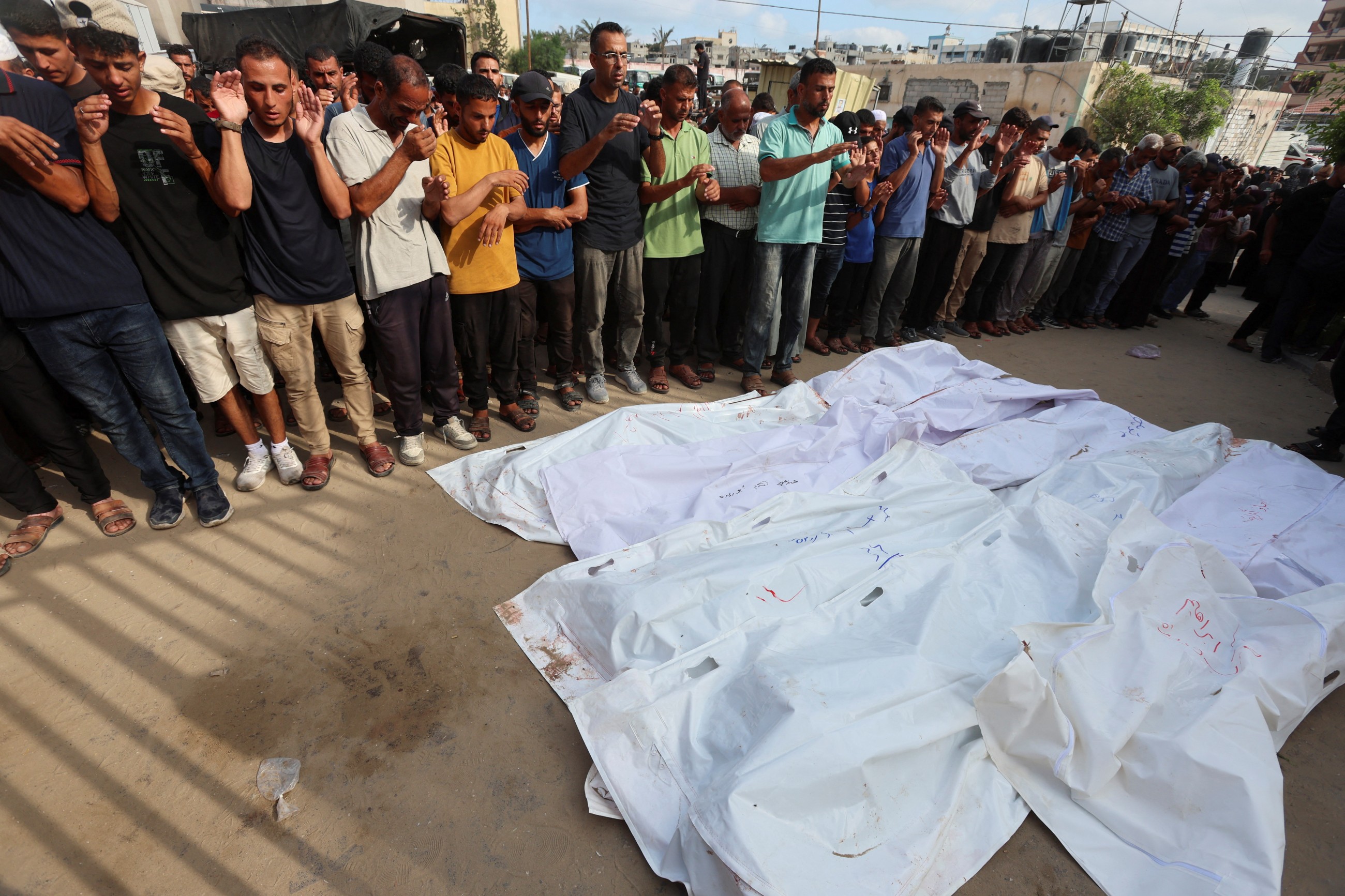 A father mourns 2 sons killed in an Israeli strike as hunger worsens in Gaza
