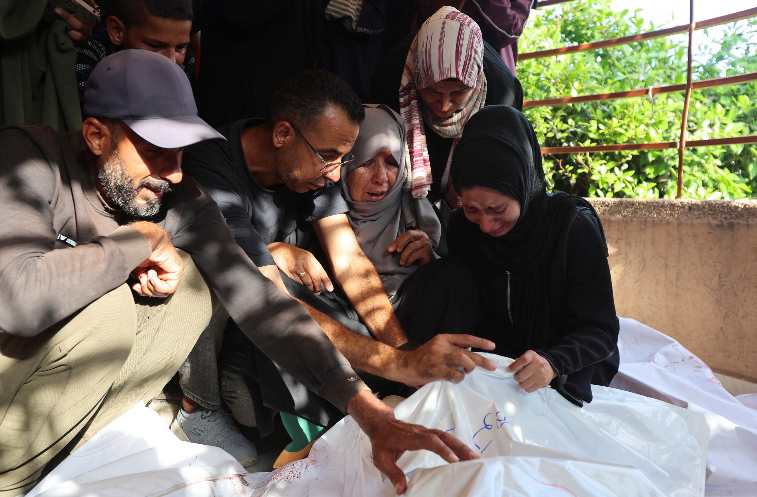 A father mourns 2 sons killed in an Israeli strike as hunger worsens in Gaza