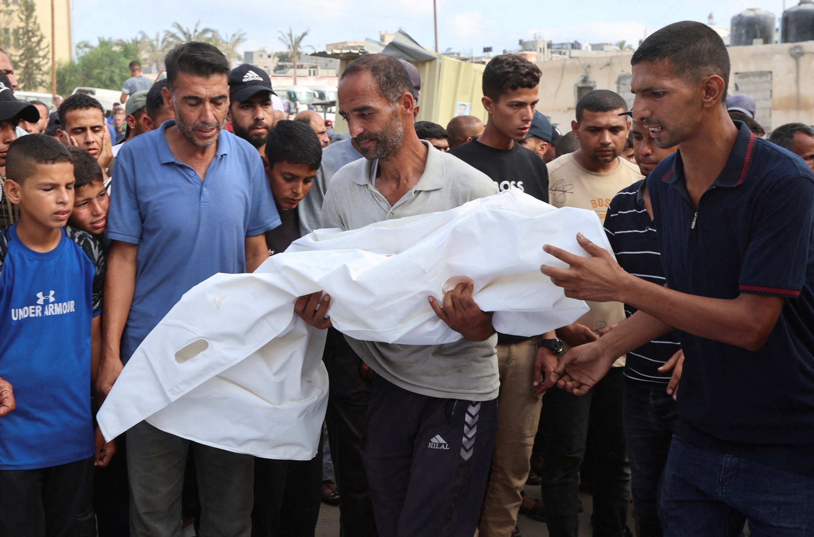 A father mourns 2 sons killed in an Israeli strike as hunger worsens in Gaza