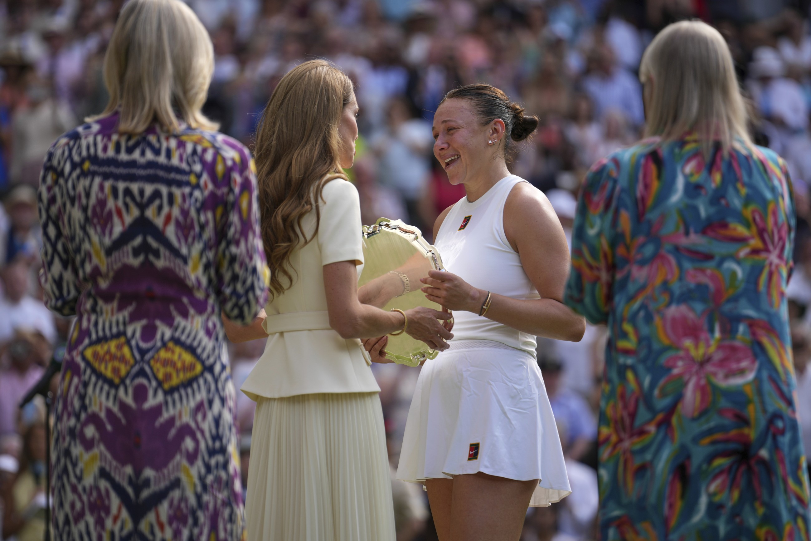 Kate presents Wimbledon winner's trophy to Swiatek, consoling words to Anisimova