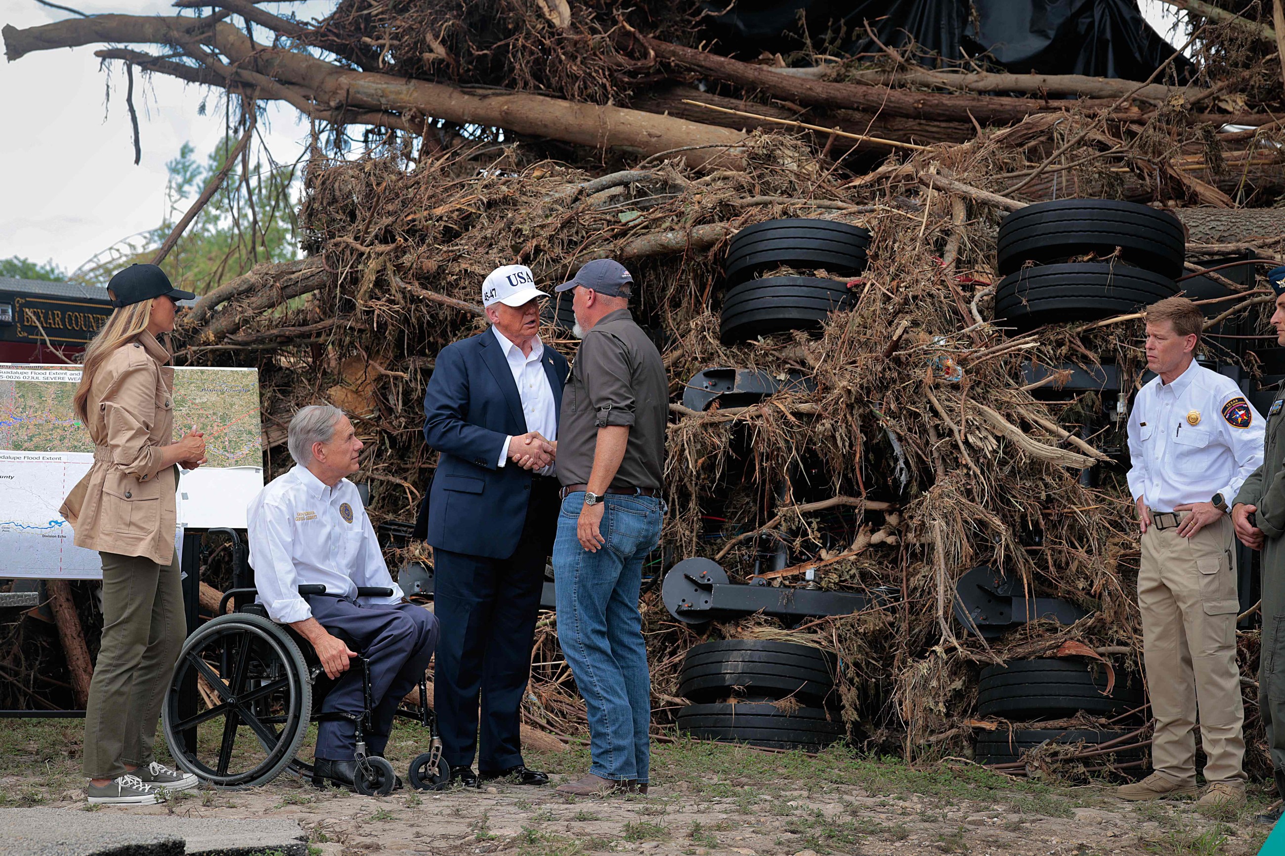 Trump visits Texas flood zone, defends government's disaster response
