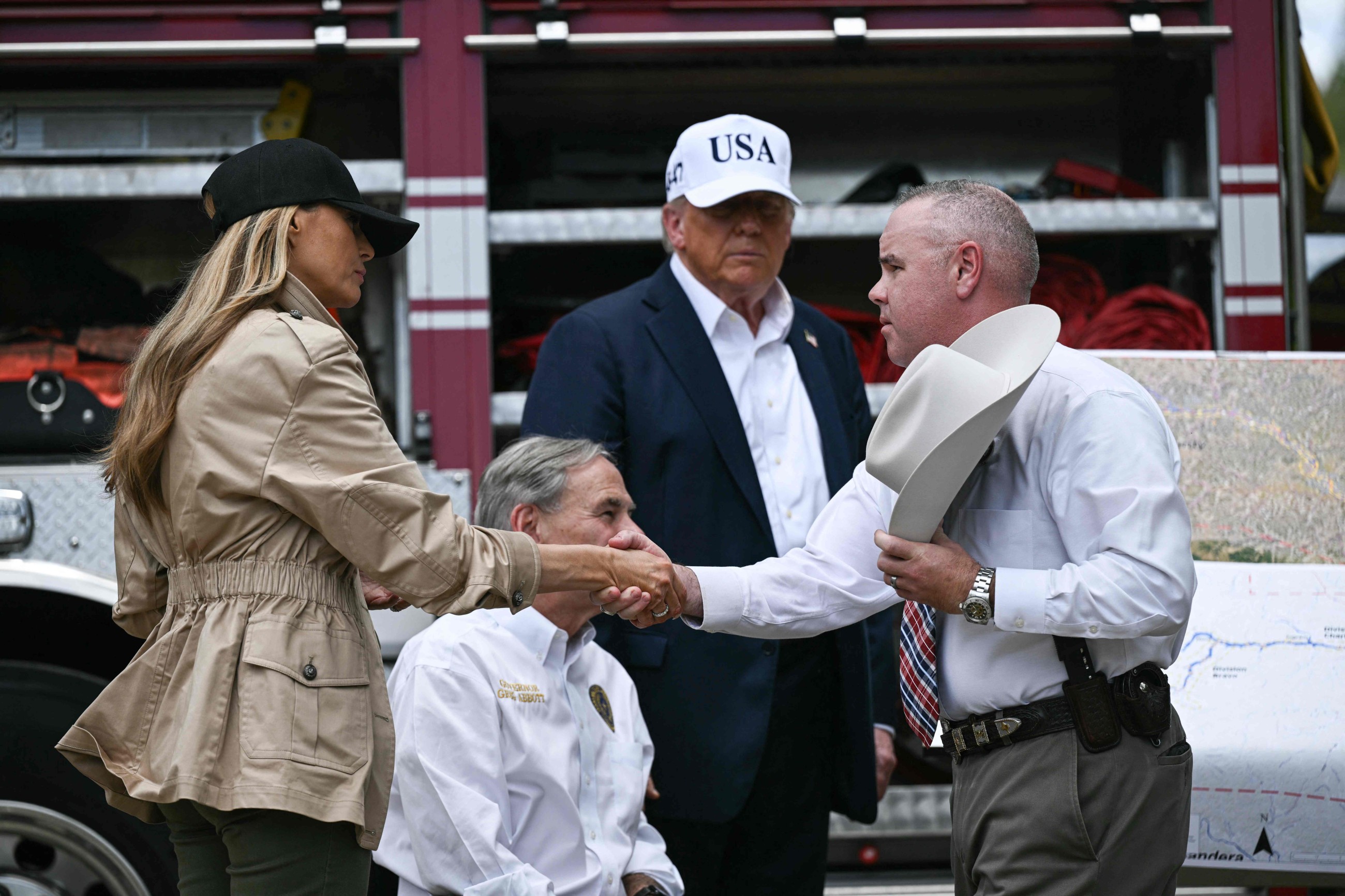 Trump visits Texas flood zone, defends government's disaster response